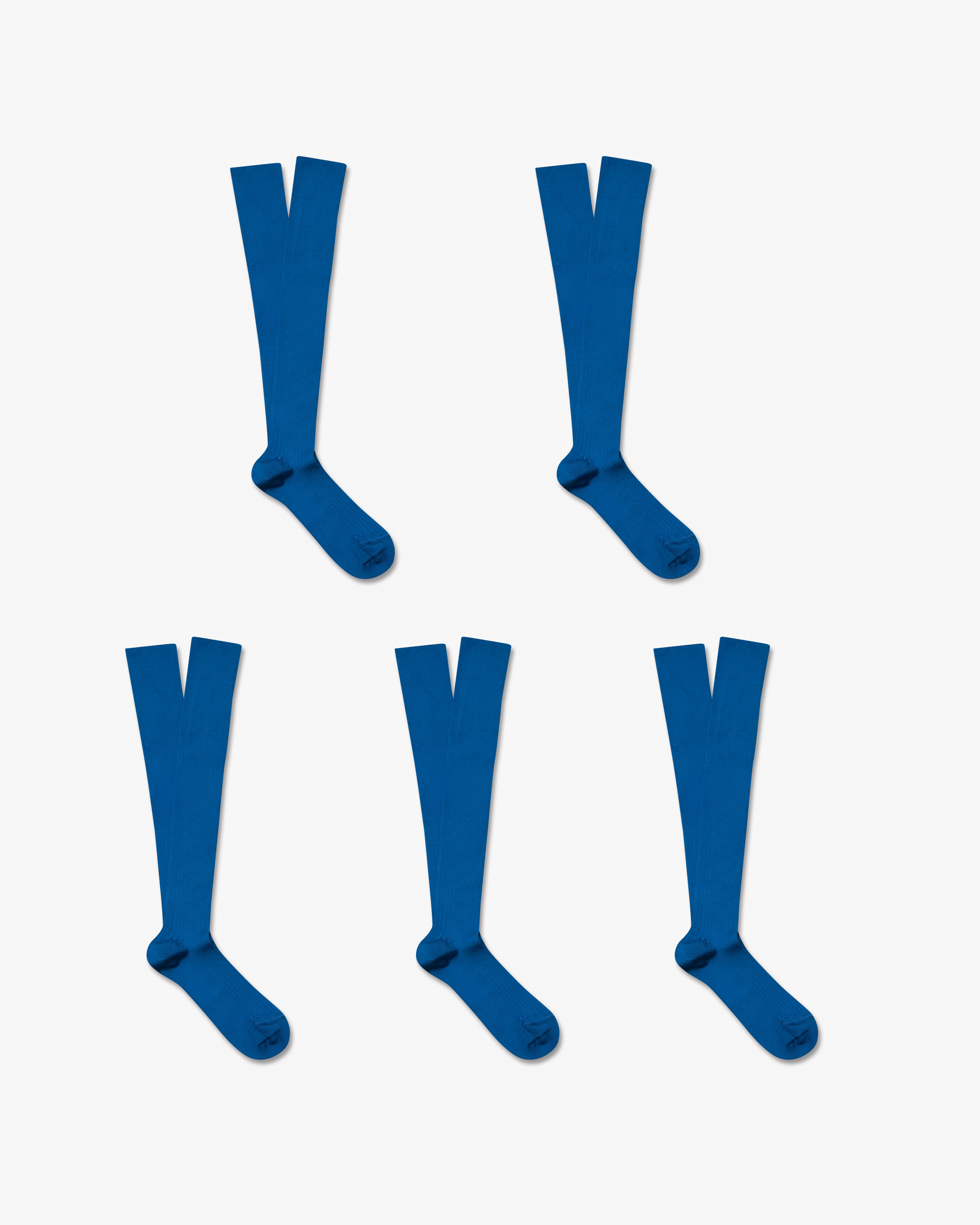 Studio shot of the Nils – Knee-High Cotton Socks 5-pack in blue, laid out against a white background.