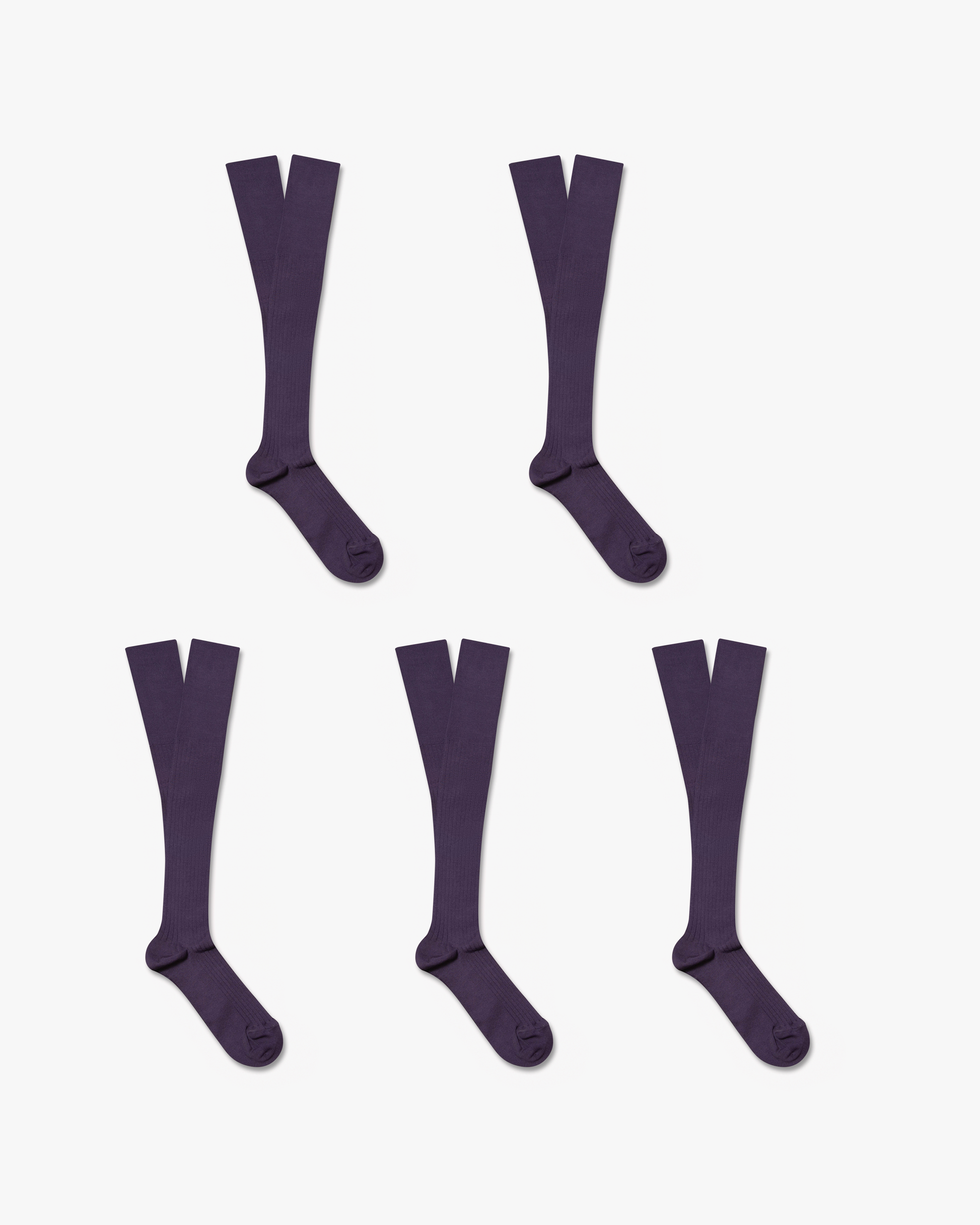 A flat lay of five pairs of purple, ribbed Nils – Knee-High Cotton Socks.