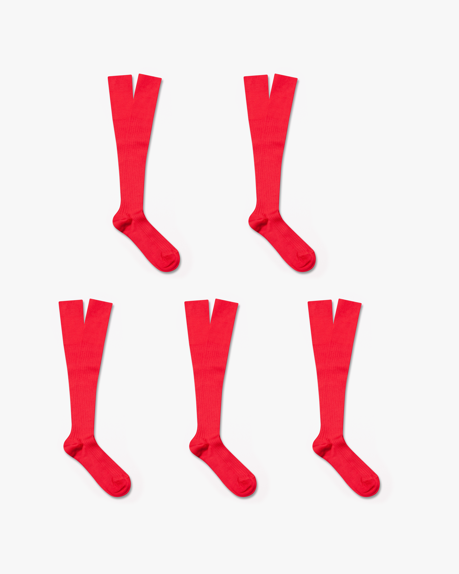 Five pairs of red, ribbed Nils – Knee-High Cotton Socks from the 5-pack, laid flat on a white background.