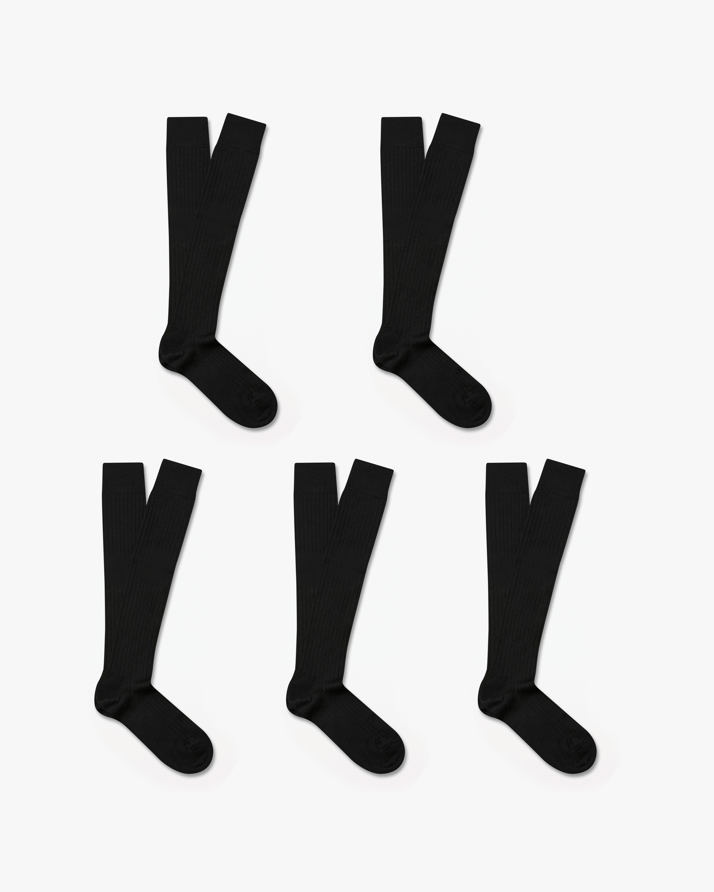 Five pairs of black Gustav – Knee-High Merino Socks laid out against a white background.