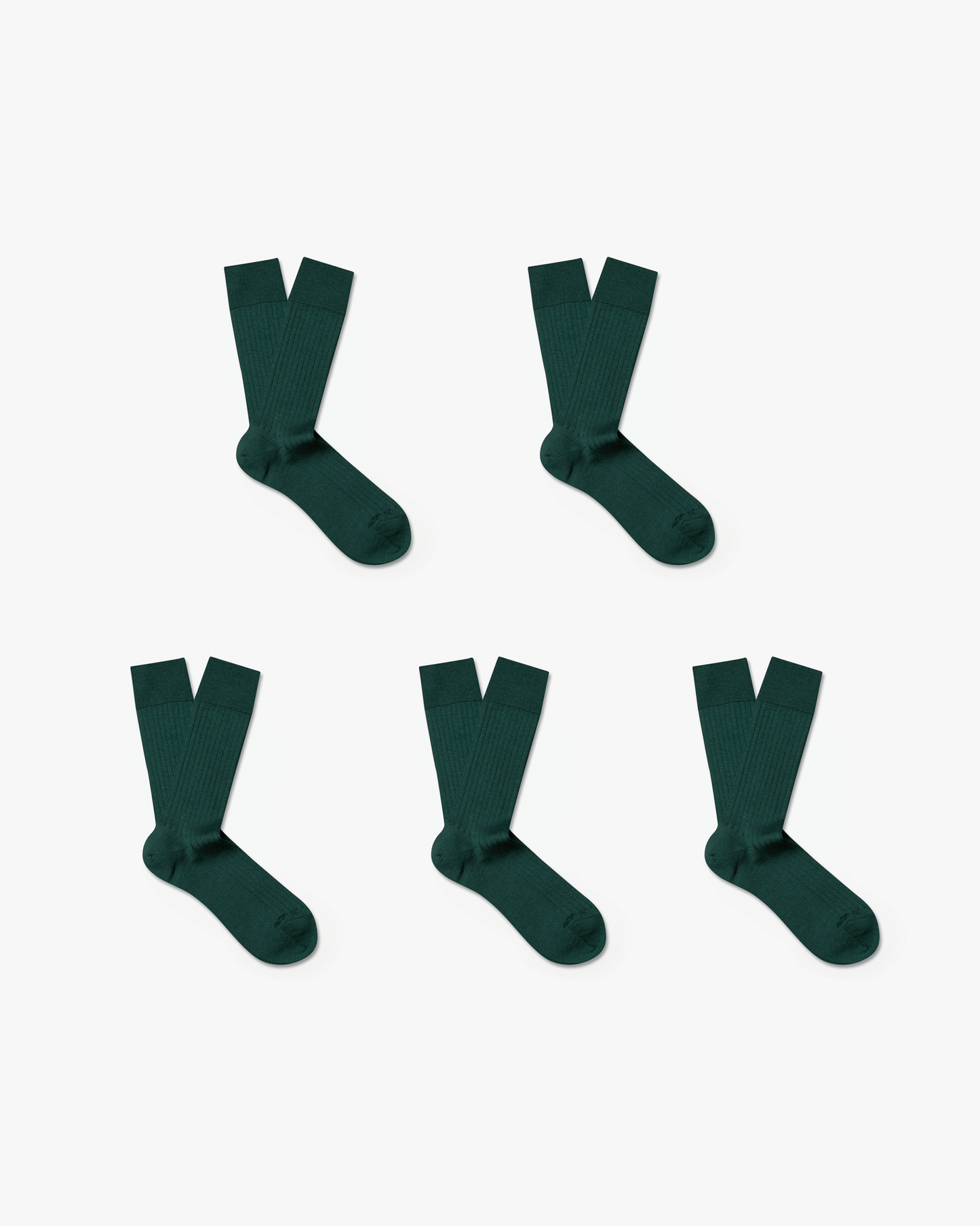 Five pairs of Ludvig – Merino Wool Socks in dark green, arranged neatly on a plain white background.