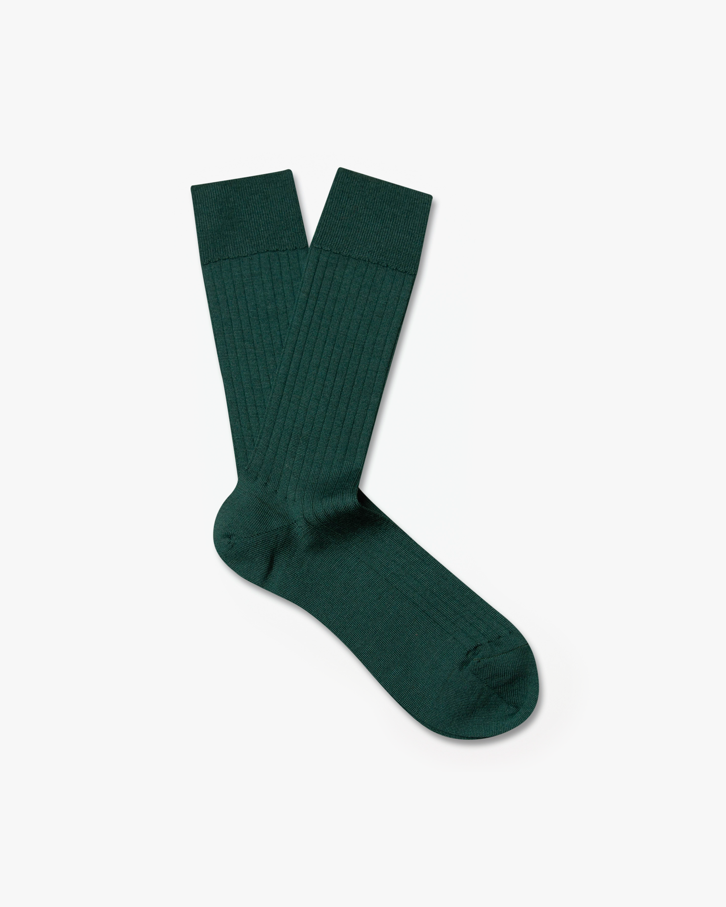 A pair of Ludvig – Merino Wool Socks in forest green, laid flat against a white background.
