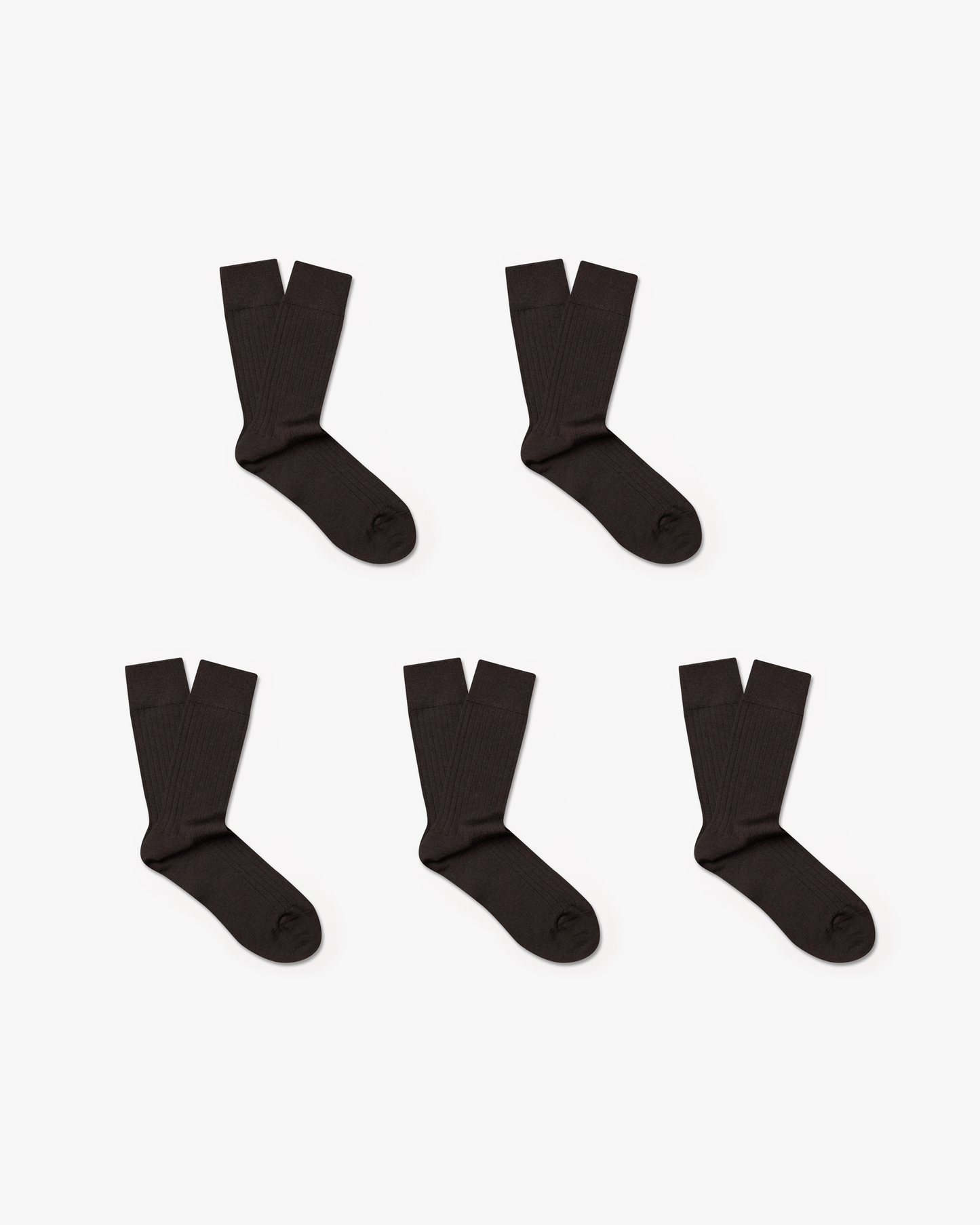 A flat lay of the Ludvig – Merino Wool Socks – 5-pack in dark brown, showing all five pairs against a white background.