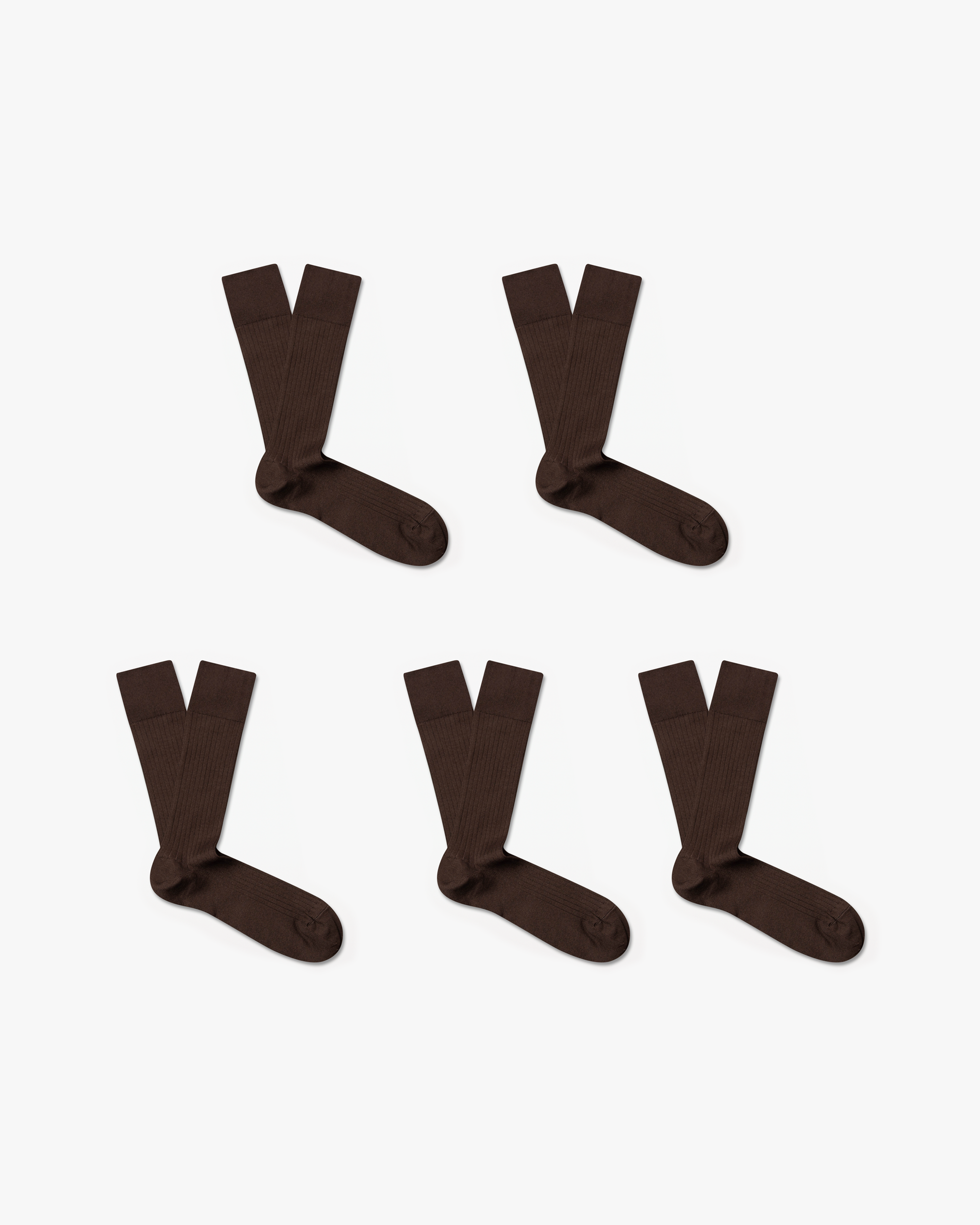 Five pairs of brown ribbed Axel – Cotton Socks laid flat against a white background.