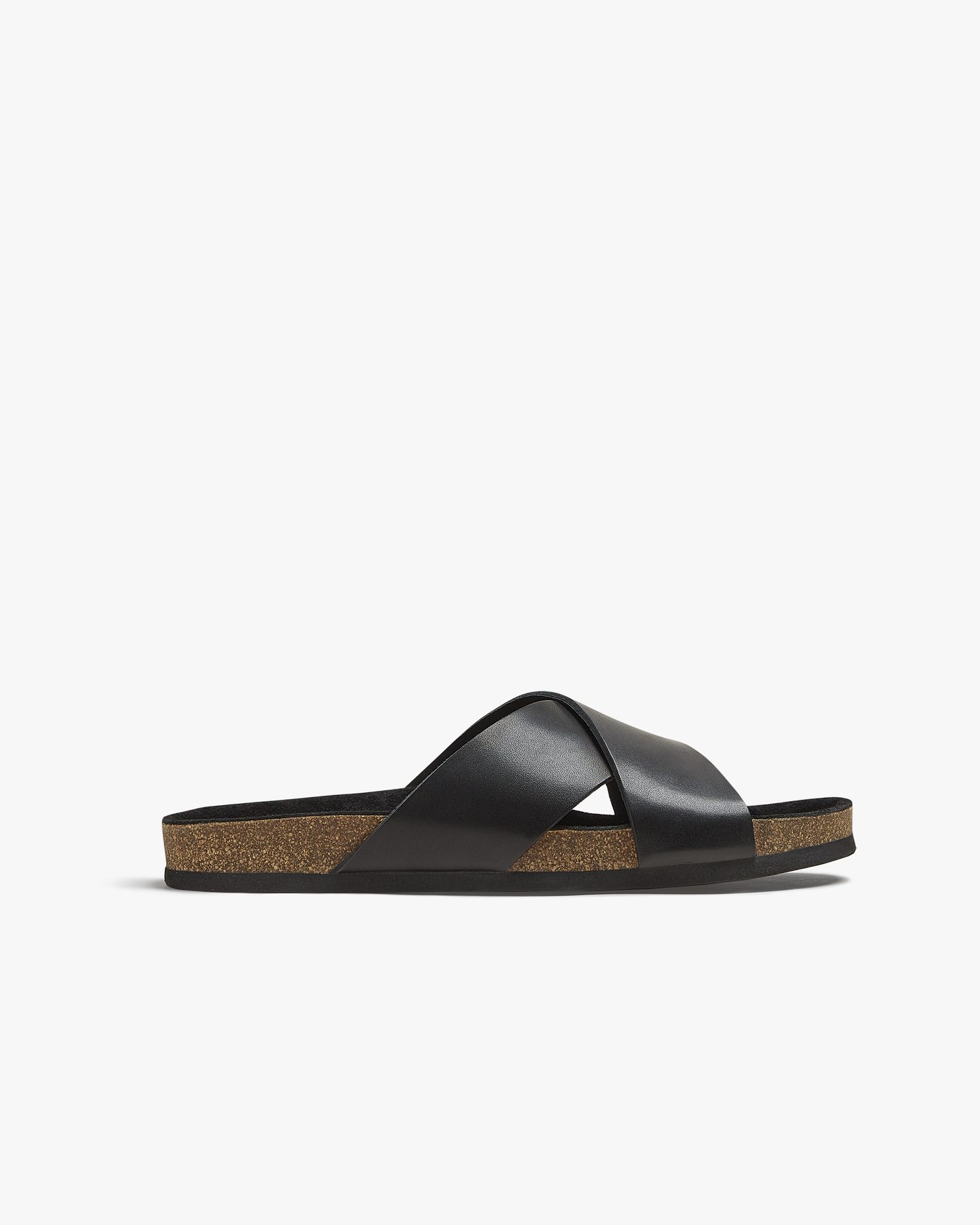 A close-up of the Solvik – Black Calf sandal, detailing its black calf leather criss-cross straps and moldable cork sole.