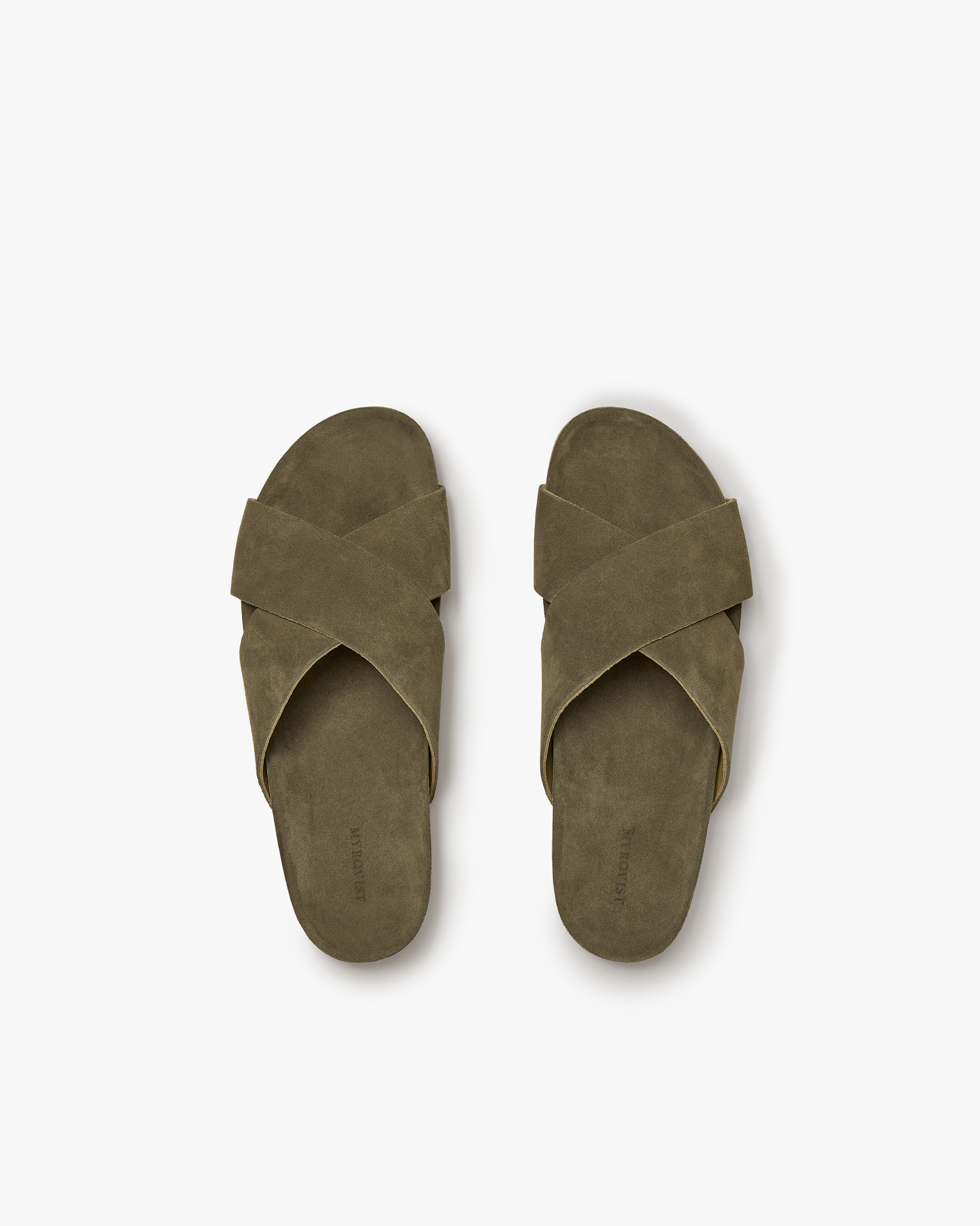 A pair of Solvik – Moss Green Suede sandals photographed from above against a clean white background.