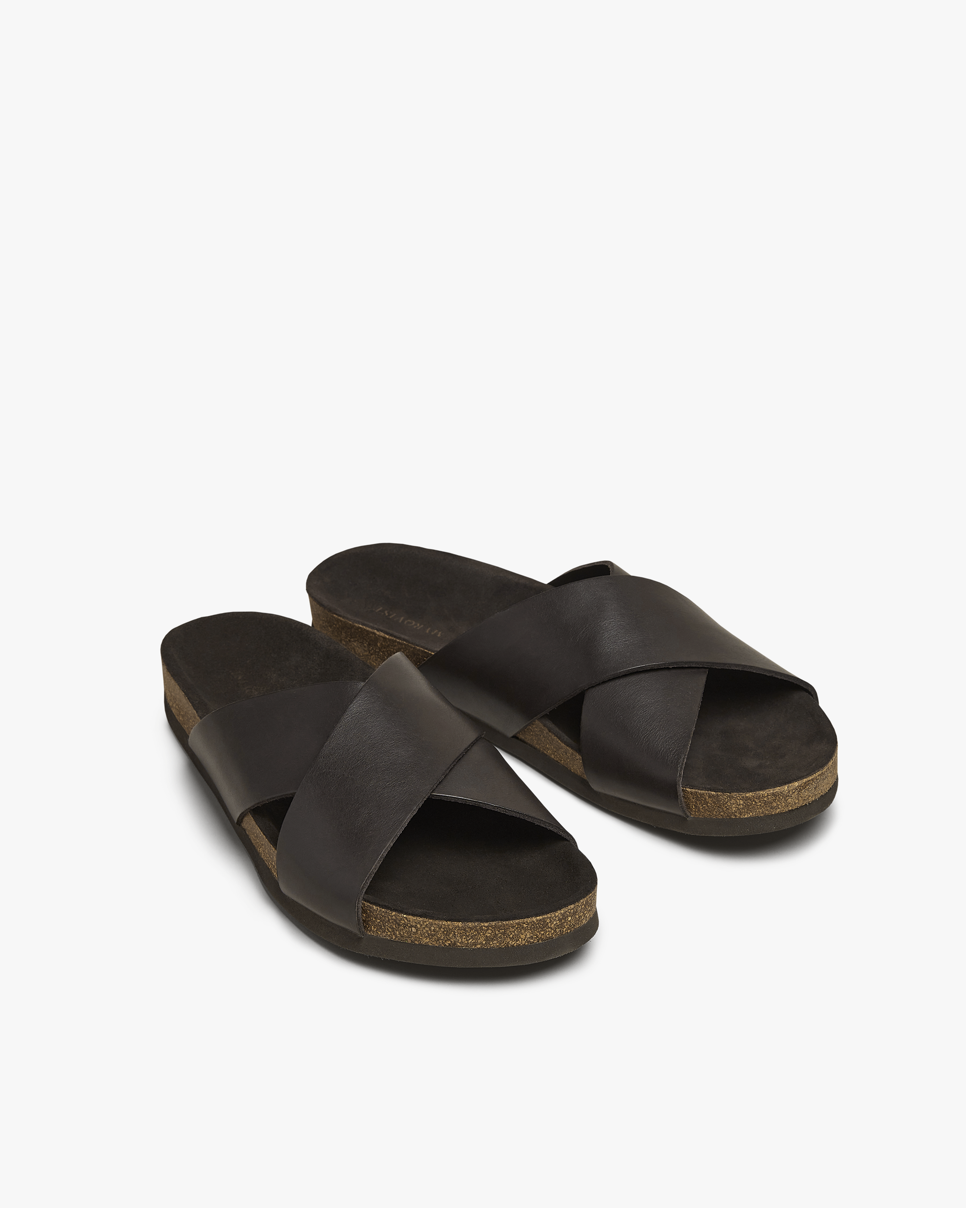 A pair of Solvik – Dark Brown Calf sandals featuring crossover leather straps and a moldable cork sole.