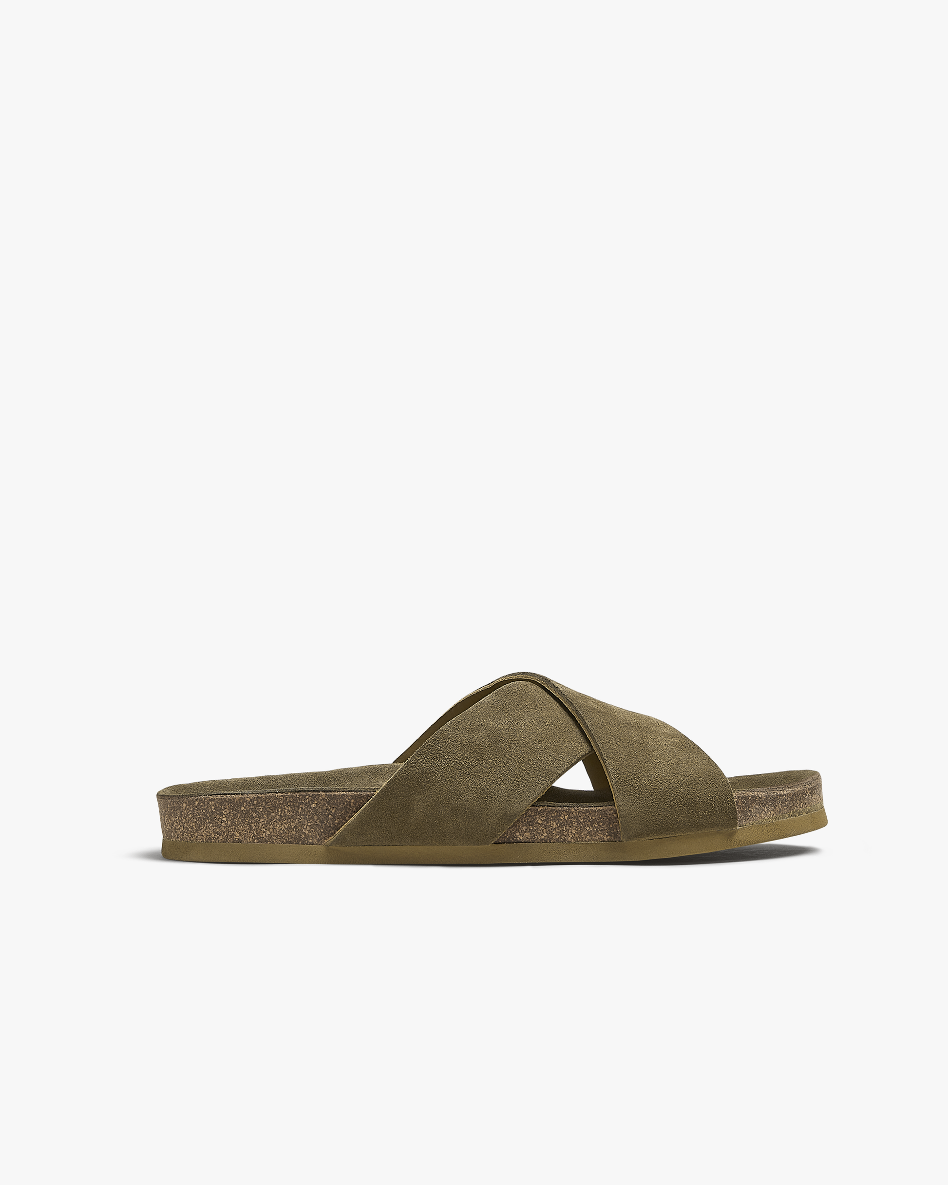 A side profile of the Solvik – Moss Green Suede sandal, detailing the crossover straps and cork sole.