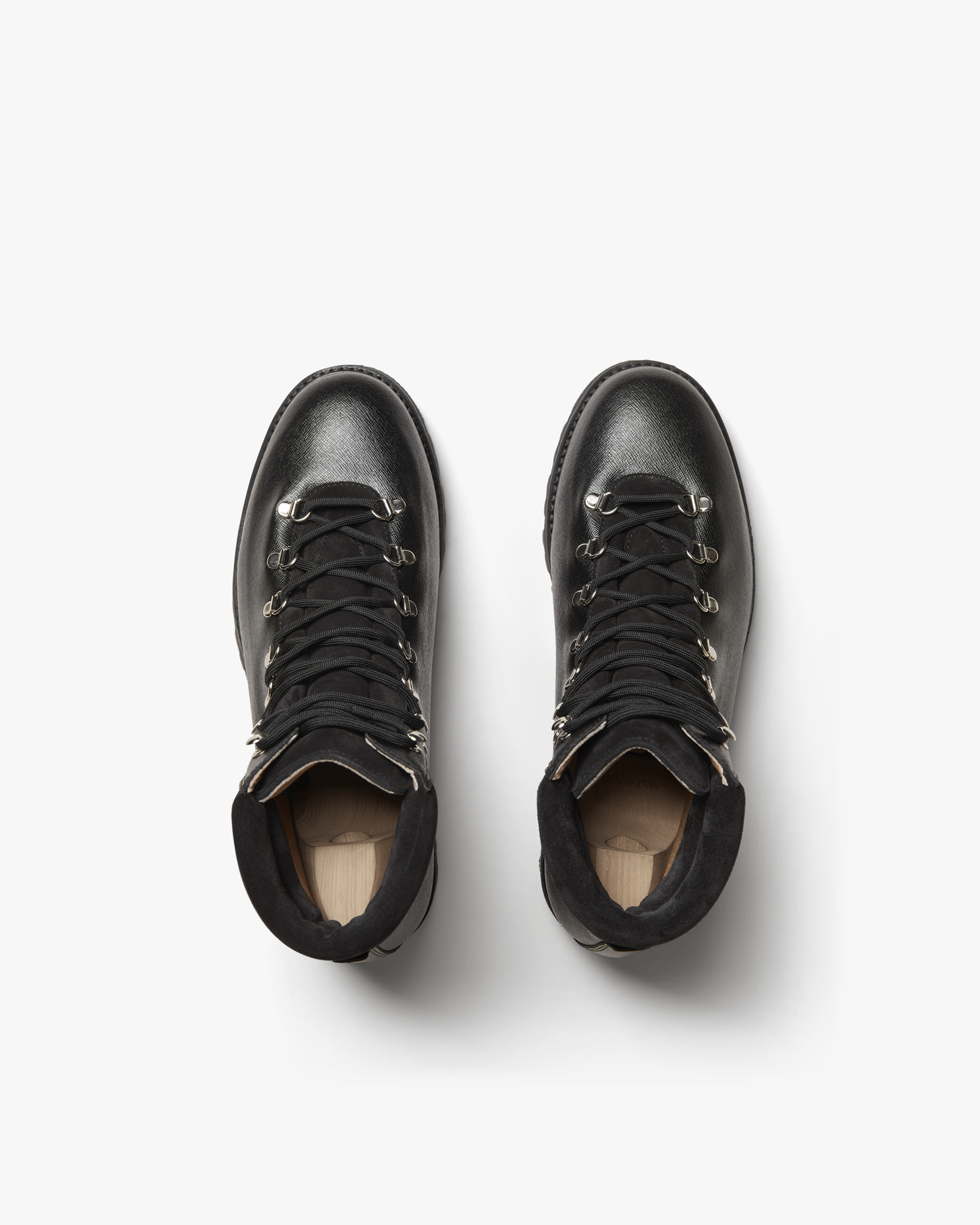 Top-down view of Duved II – Black Grain Calf hiking boots on a white background, with wooden shoe trees inside.