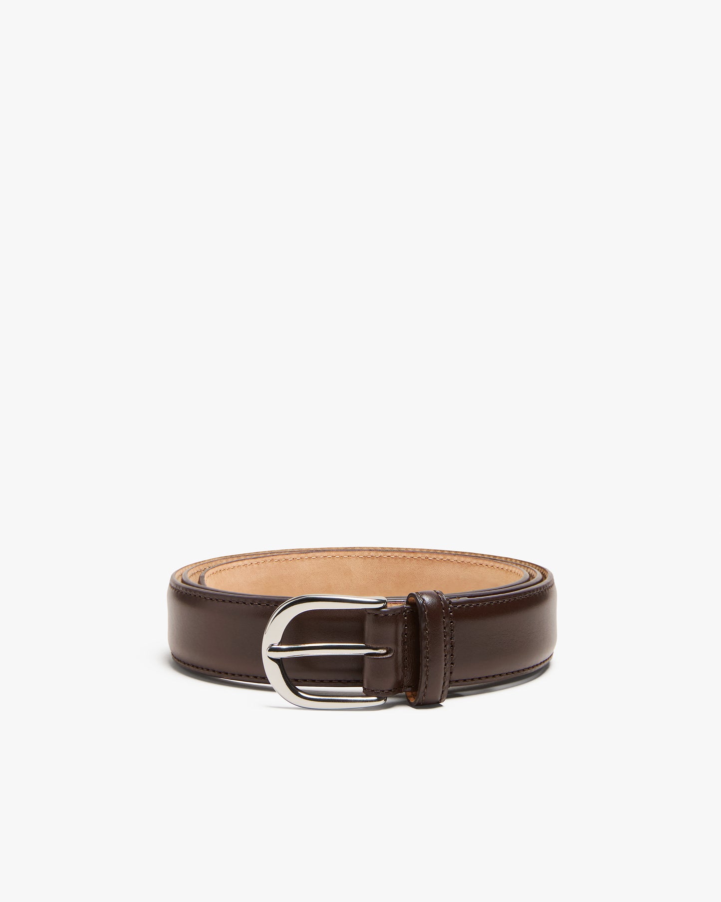 Dark brown leather belt with a polished finish, featuring precise stitching and a silver round buckle, styled for versatile wear with tailored trousers or denim.