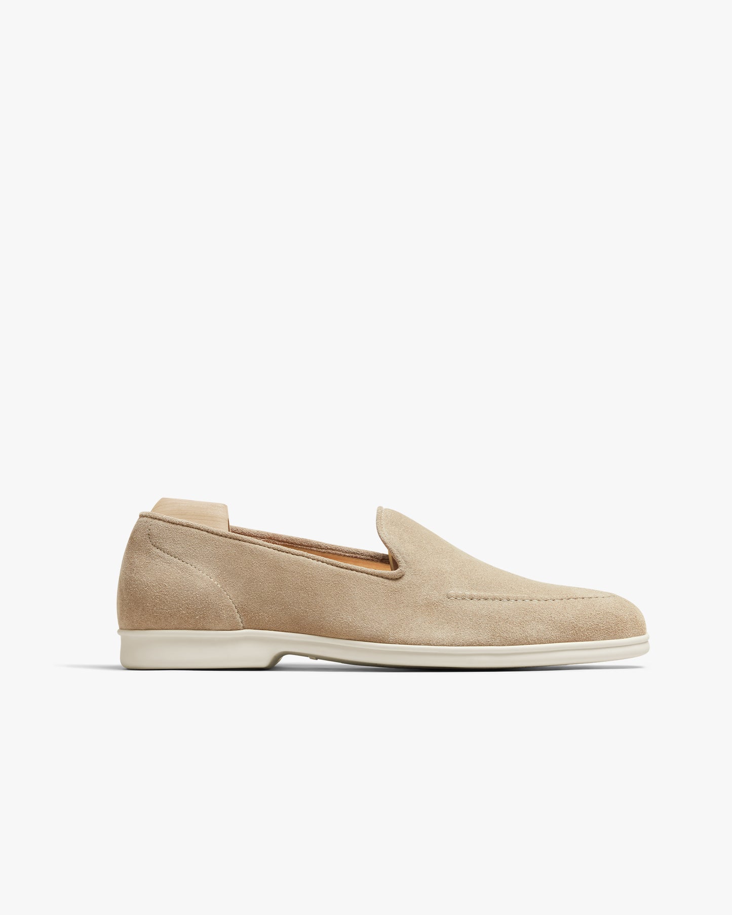 A close-up of the Brännö II – Sand Suede loafer, detailing the side profile and the rubber sole.
