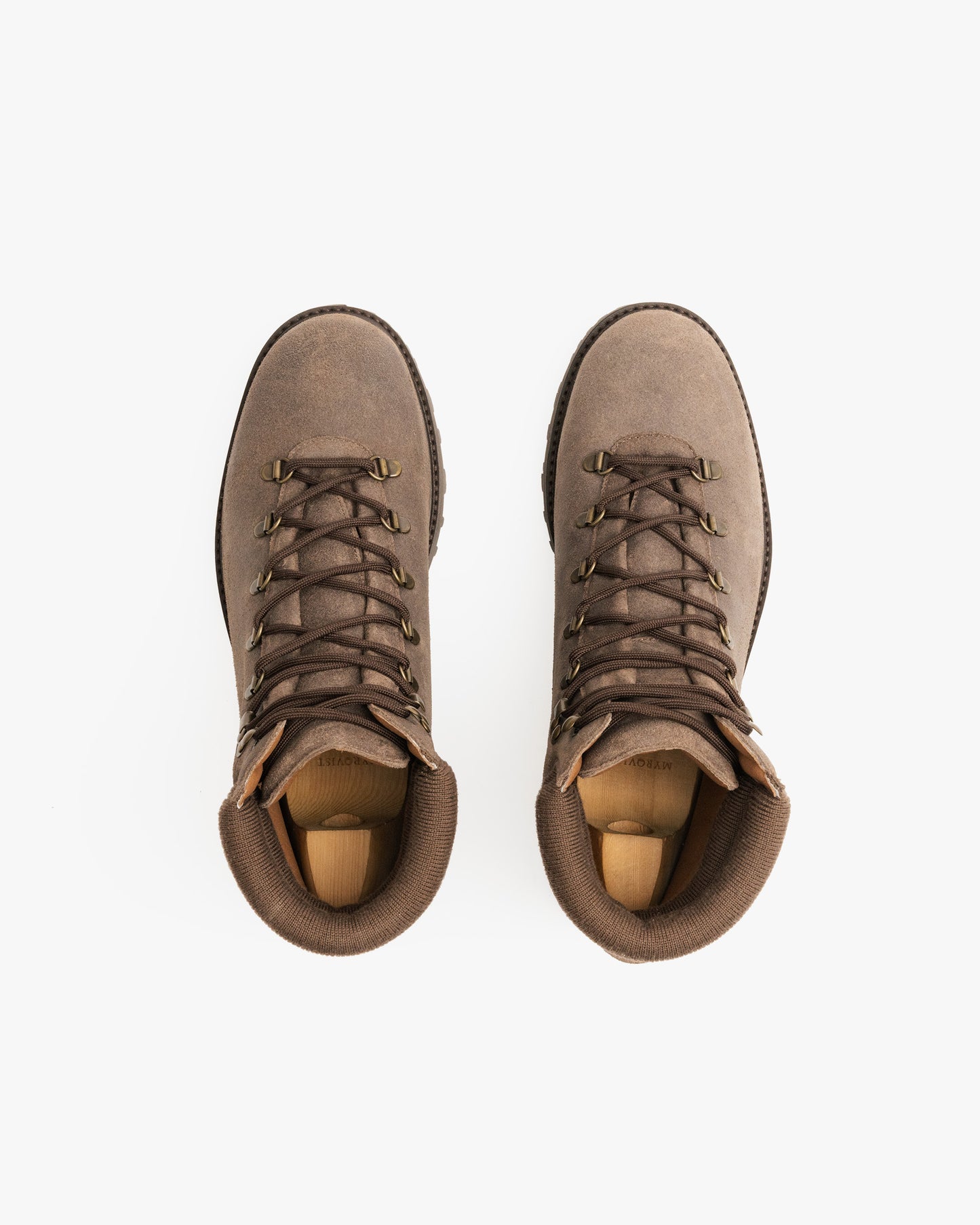 Top-down view of a pair of Duved II – Taupe Waxed Suede boots with shoe trees, against a white background.