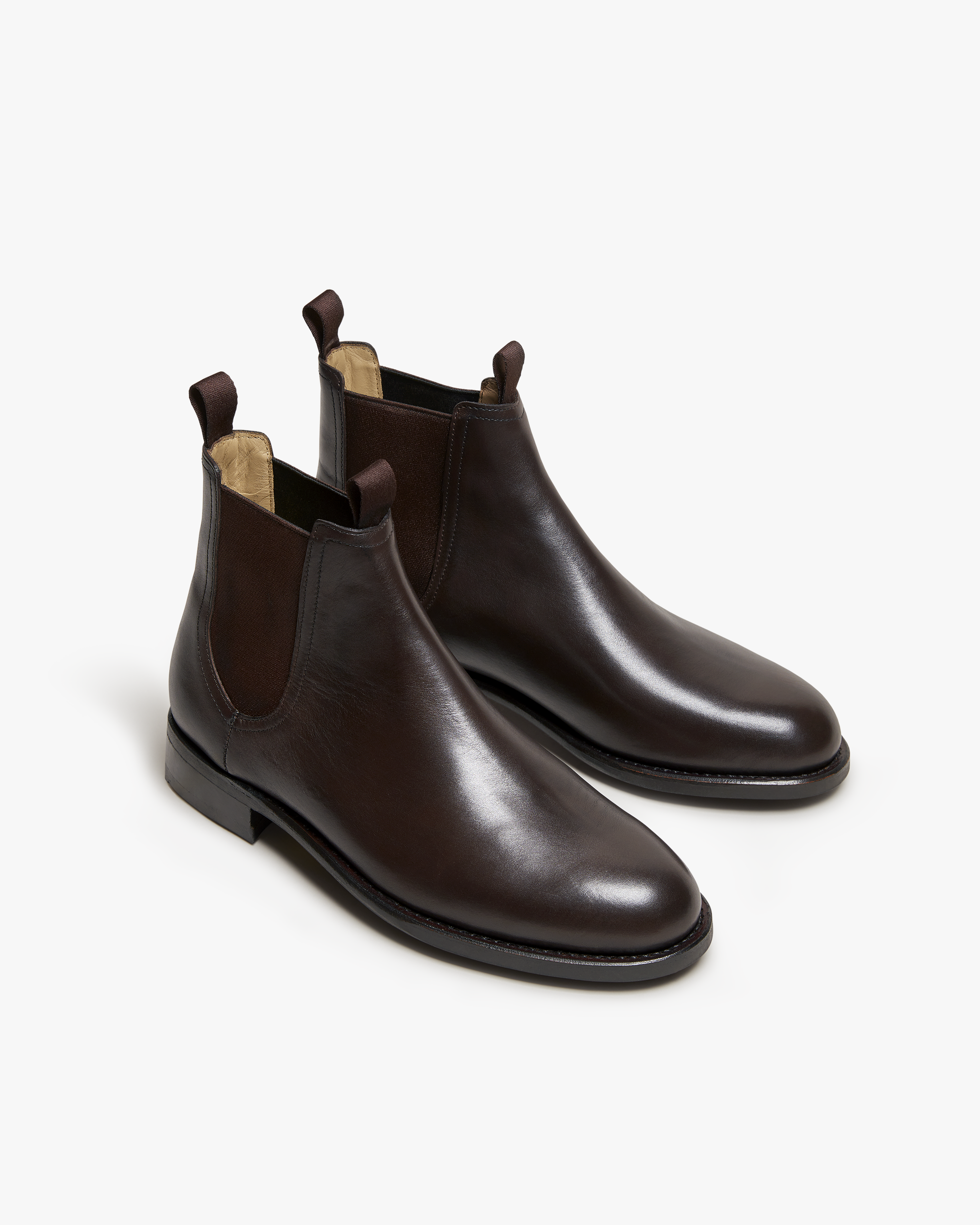 A pair of Elfvik – Dark Brown Calf Chelsea boots, shown from a three-quarter angle against a clean white background.