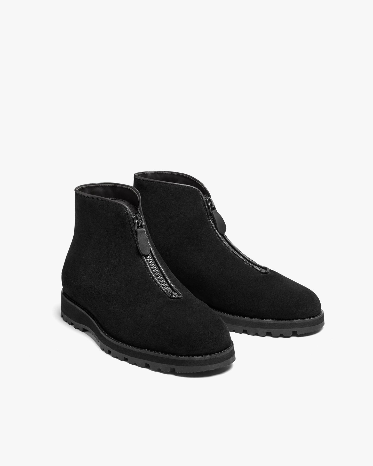 A pair of Funäs – Black Suede boots with a front zipper closure, shown against a plain white background.