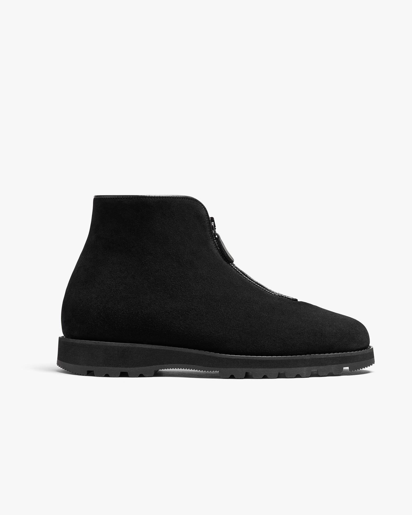 A close-up of Funäs – Black Suede, detailing the side profile, zipper closure, and hiking sole.