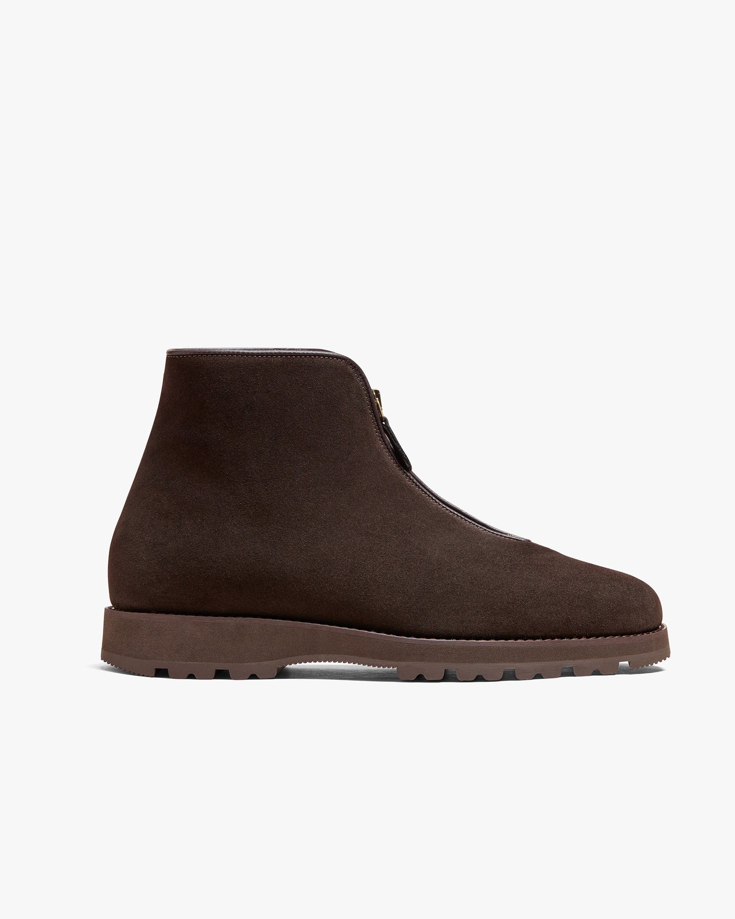 A side profile of Funäs – Dark Brown Suede, highlighting its whole-cut design, zipper closure, and robust hiking sole.