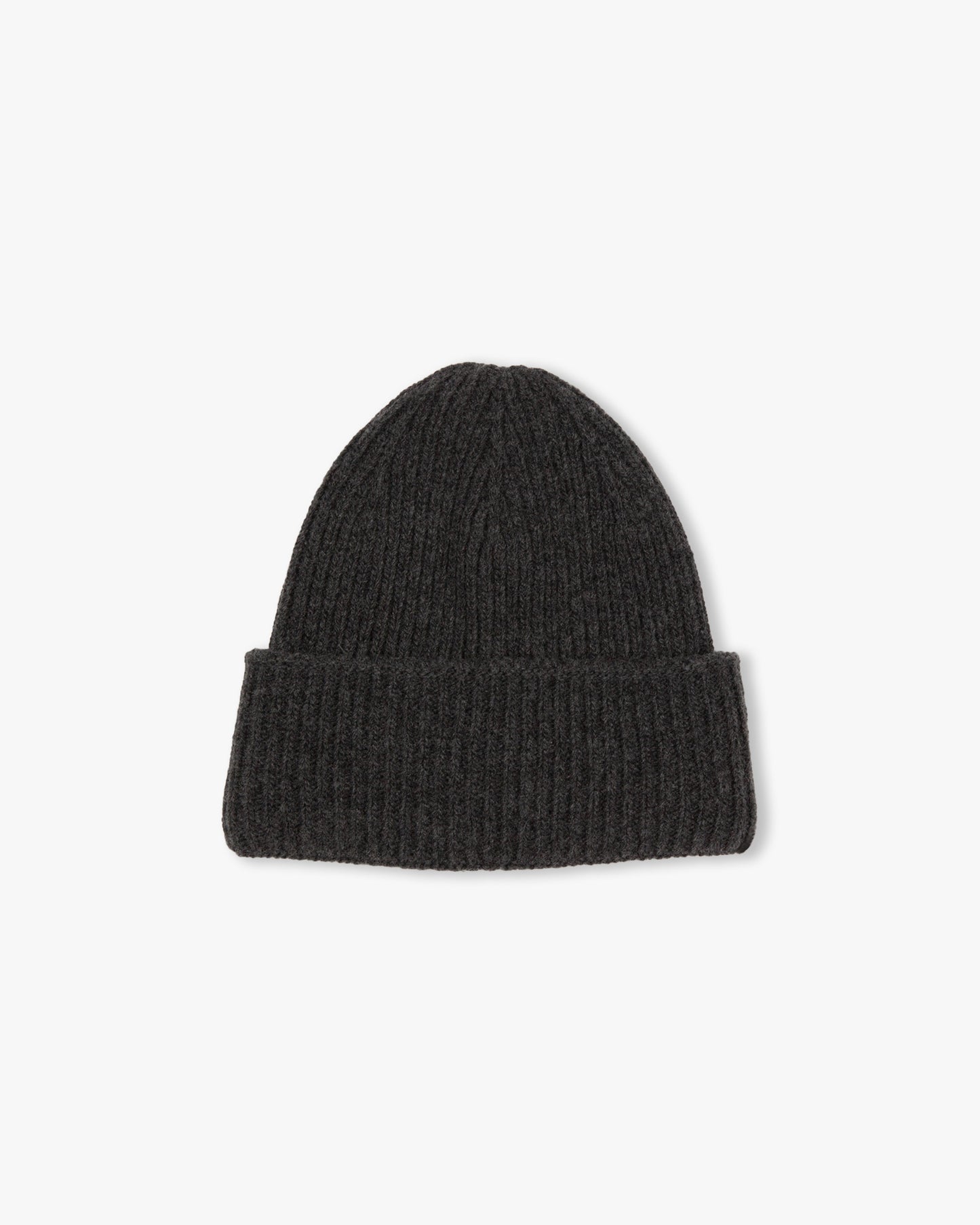 A studio shot of the Myrqvist Hat – Merino/Cashmere – Dark Grey, showing its ribbed knit texture and folded cuff.