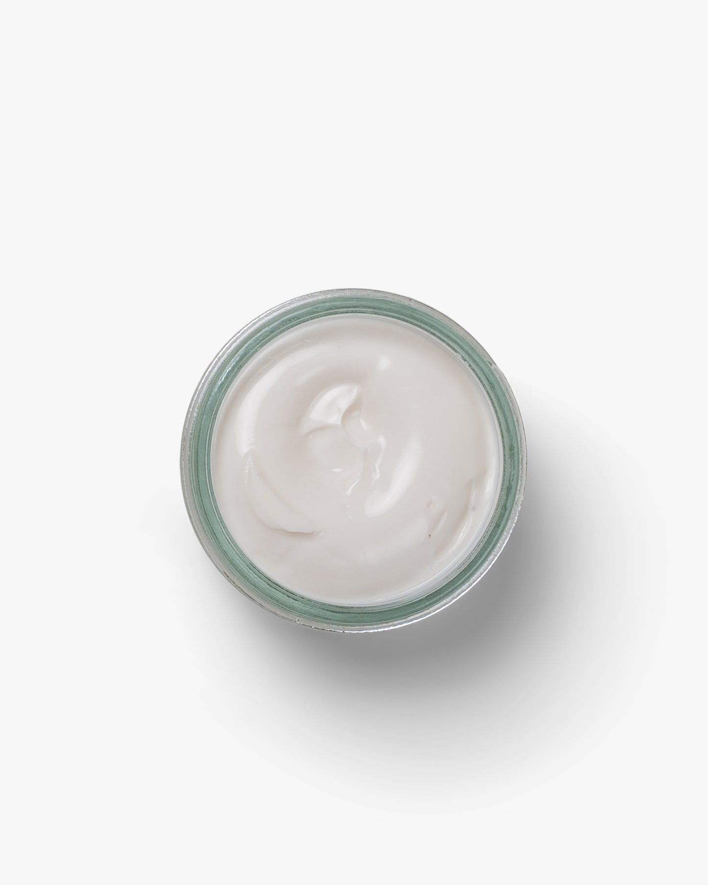A jar of Myrqvist Shoe Cream in neutral, showcasing its smooth, creamy texture designed to condition and restore a variety of leather shoe colours and finishes.