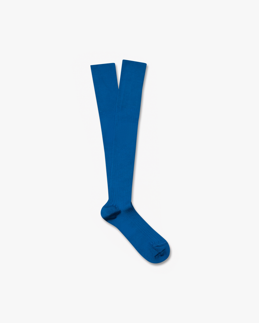 A pair of Nils – Knee-High Cotton Socks in blue, displayed flat against a white background.