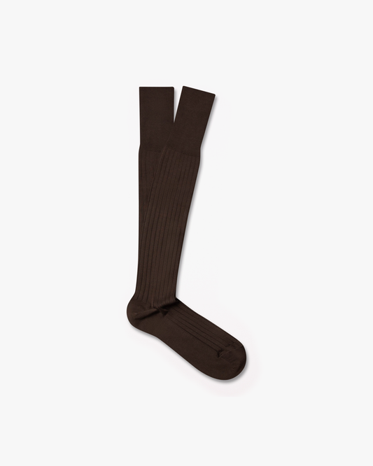 A pair of brown, ribbed Nils – Knee-High Cotton Socks, laid flat against a white background.