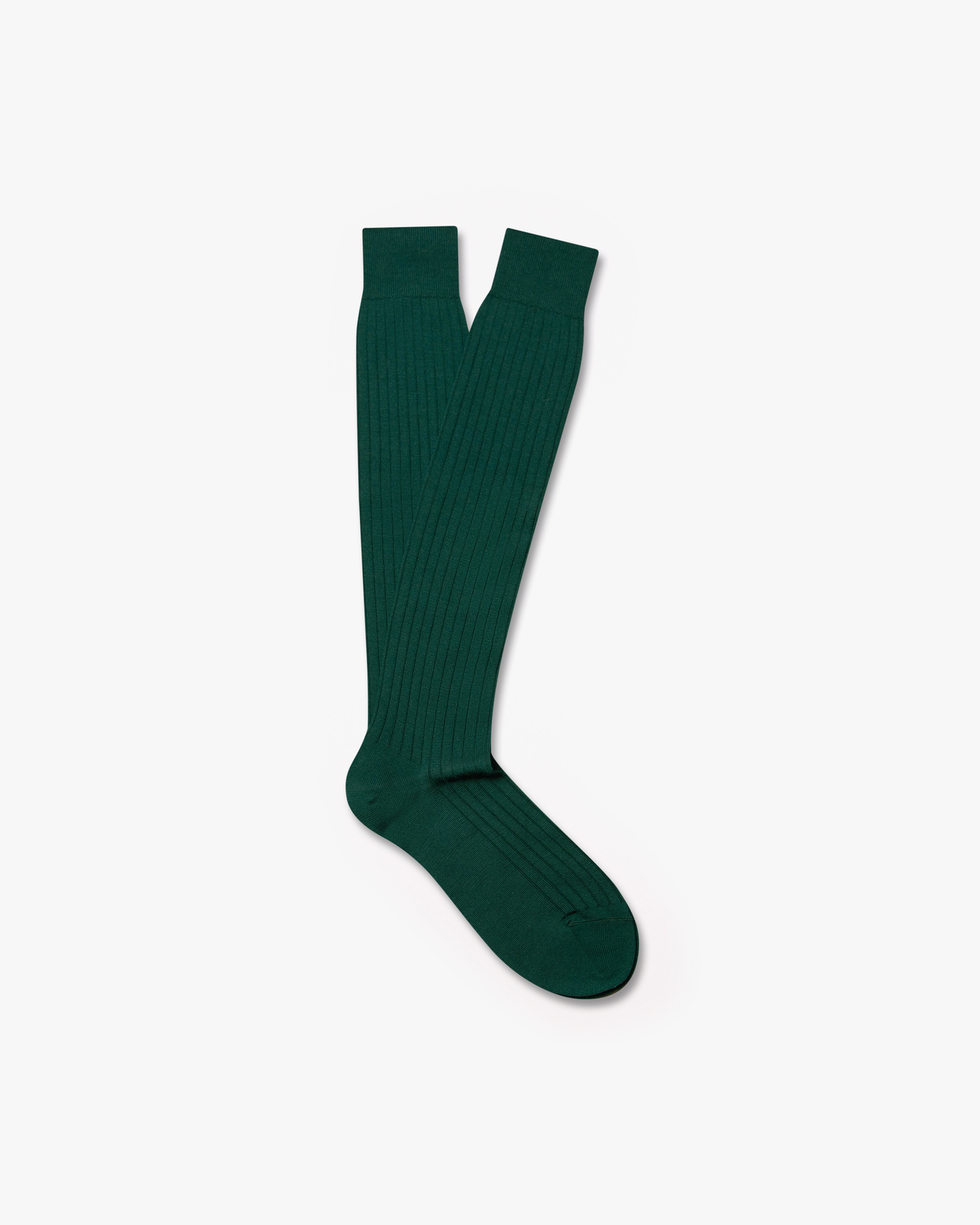 A pair of Gustav – Knee-High Merino Socks in forest green, against a white background.