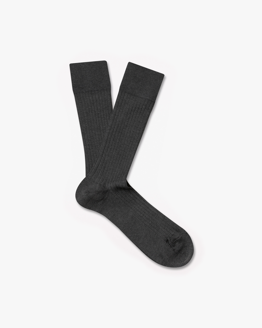 A pair of Axel – Cotton Socks – Grey laid flat to display their ribbed texture against a white background.