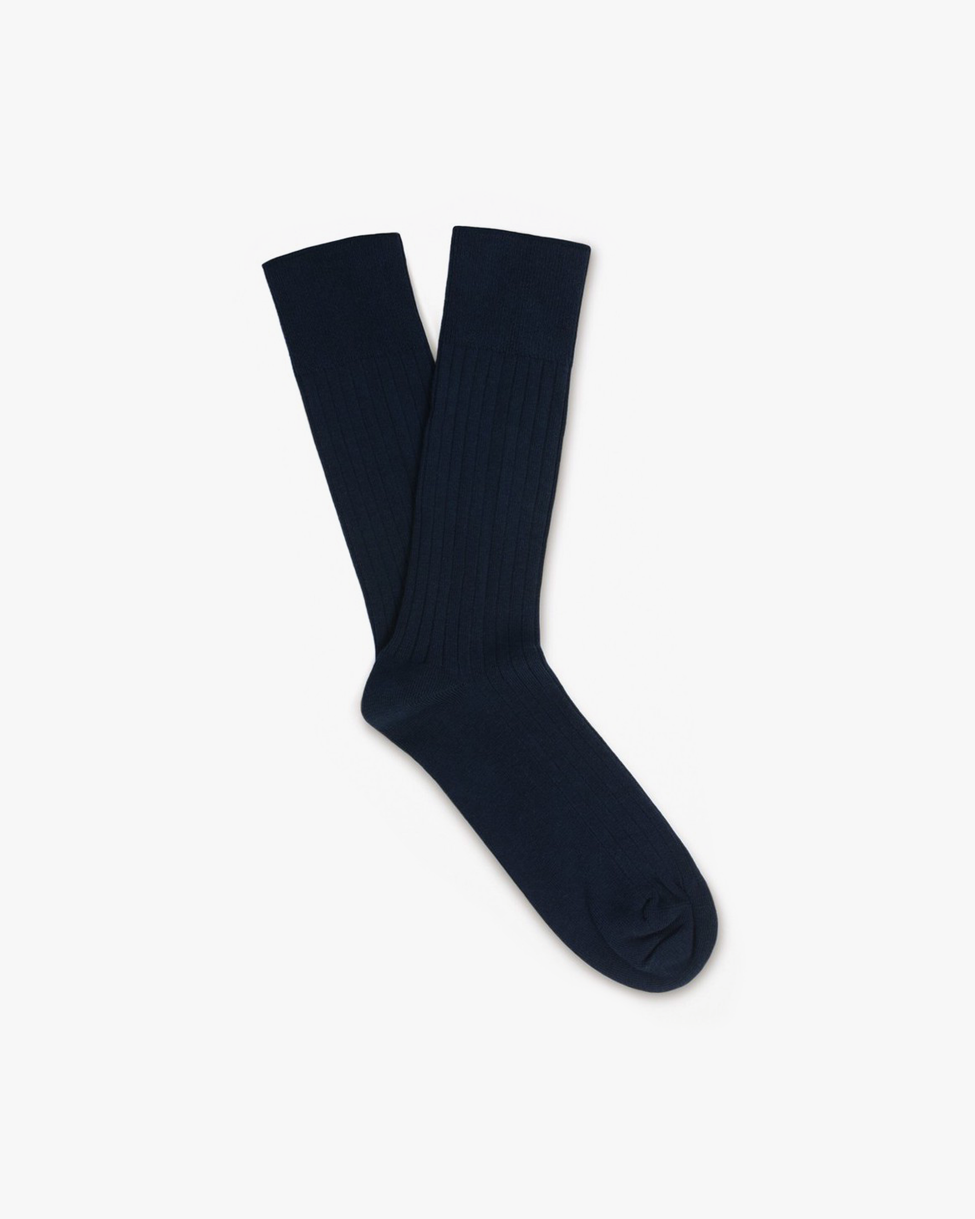 A pair of navy ribbed Oscar – Cotton Socks laid flat against a white background.