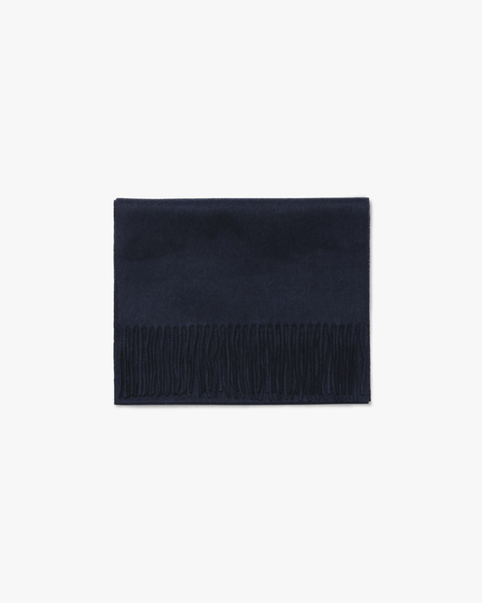 Studio shot of the Wool Scarf – Navy, neatly folded on a white background.