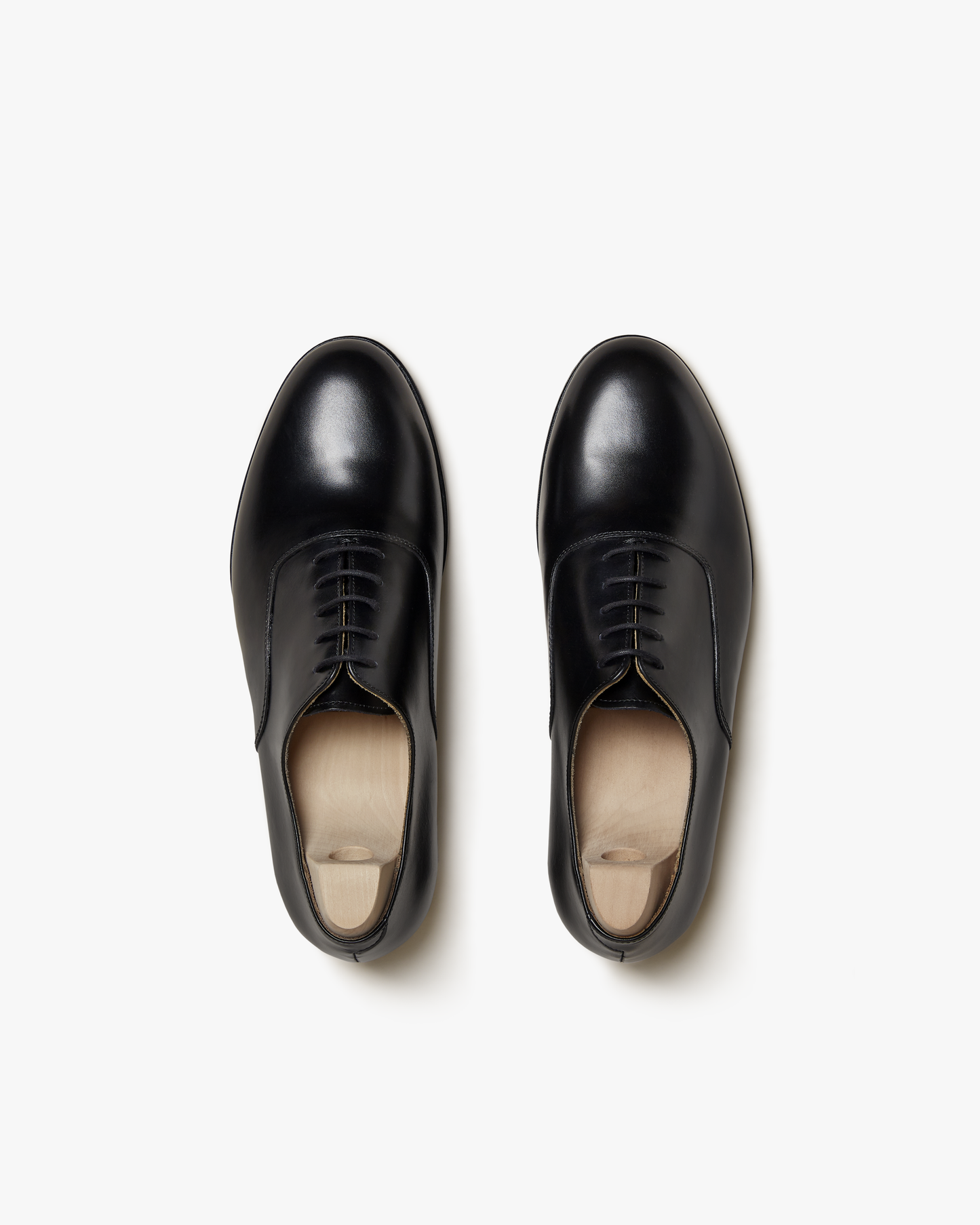 A top-down view of the Arvika II – Black Calf oxford shoes, highlighting the plain toe design on a clean white background.