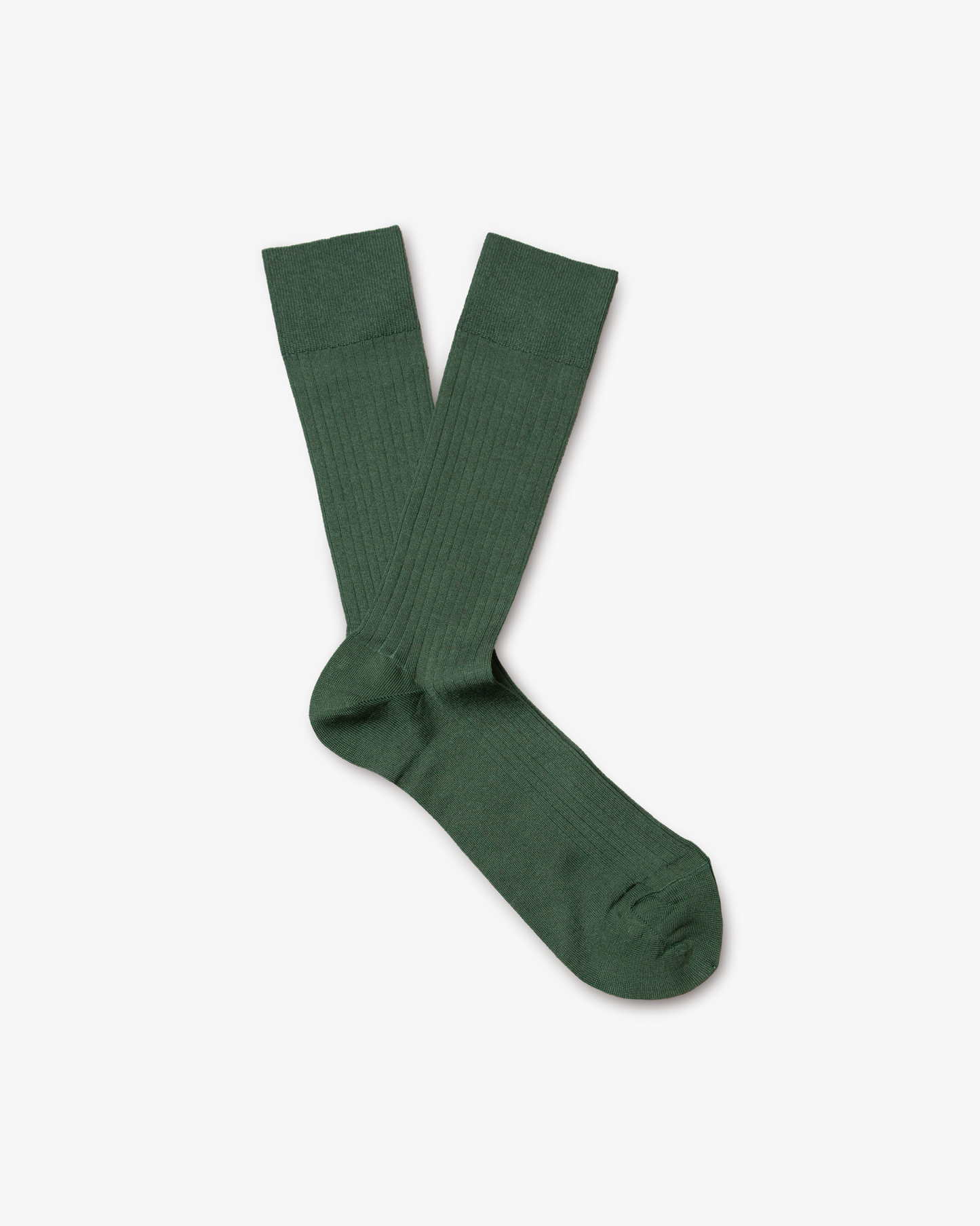 A flat lay image of Axel – Cotton Socks – Bottle Green, highlighting the refined ribbed structure.