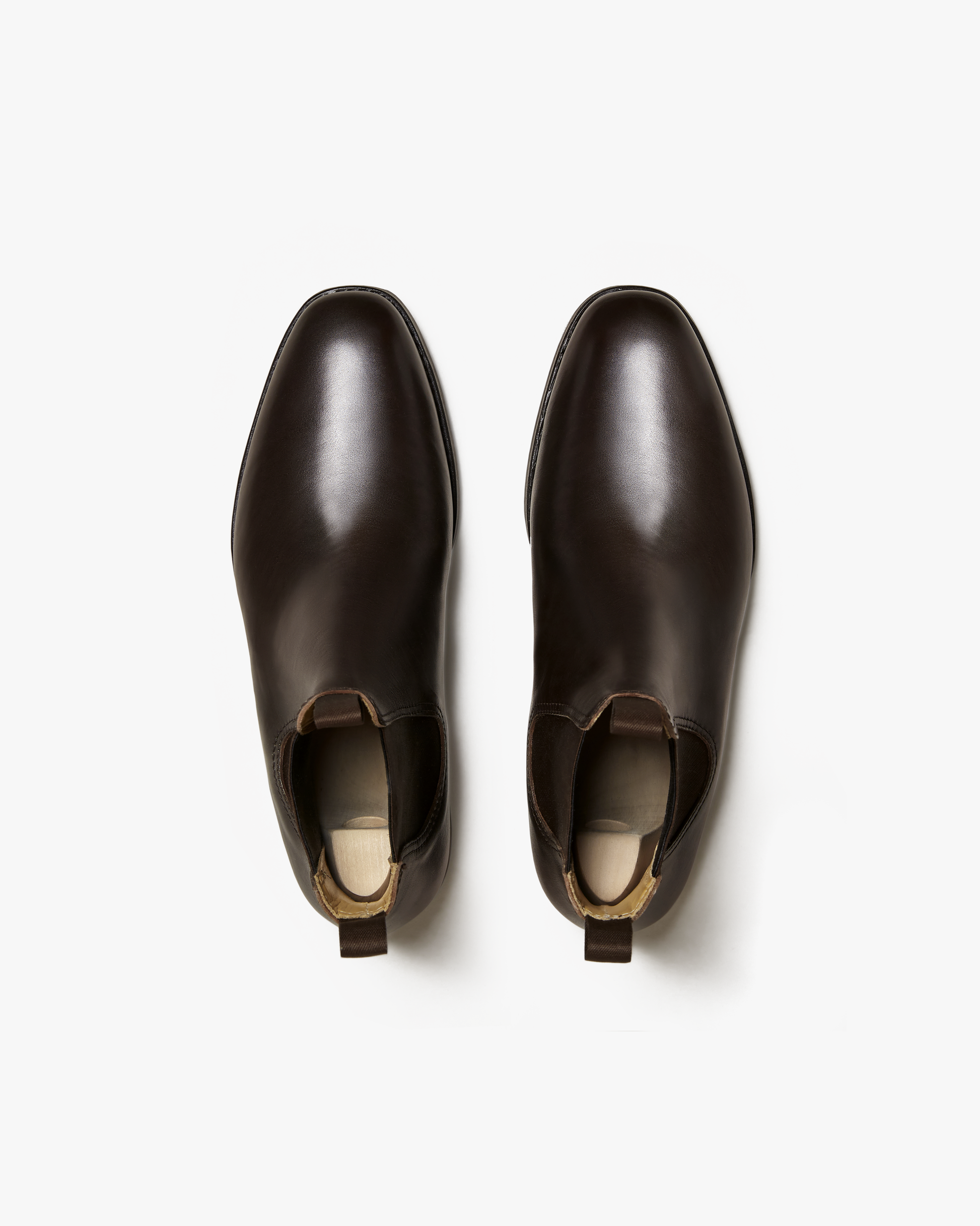 A pair of Granhult – Dark Brown Calf Chelsea boots, photographed from above against a white background.