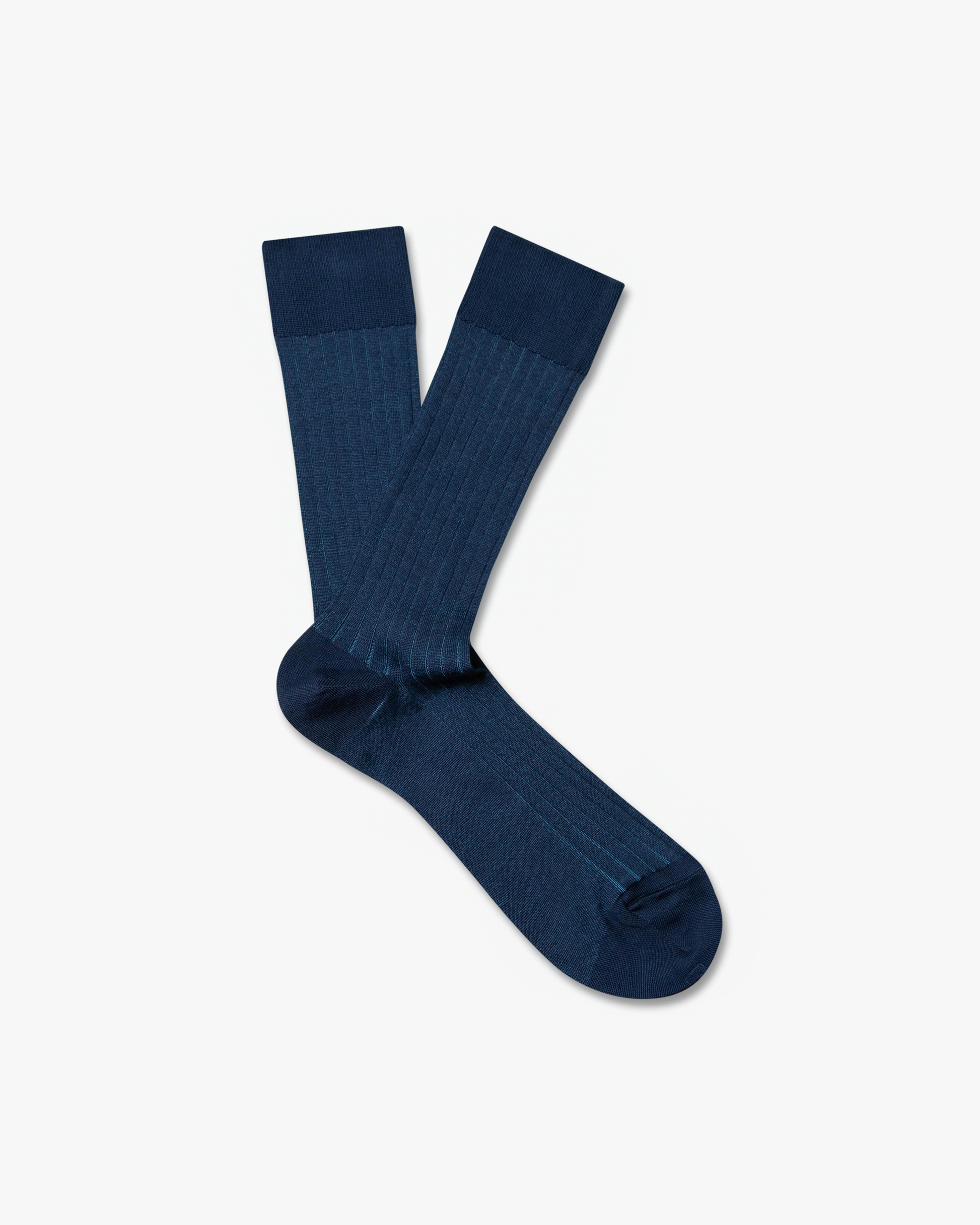A pair of Victor – Cotton Socks in blue laid flat against a white background, showing the ribbed texture.