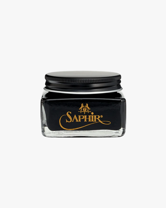 A glass jar of Saphir – Crème Cordovan shoe cream in the colour black.