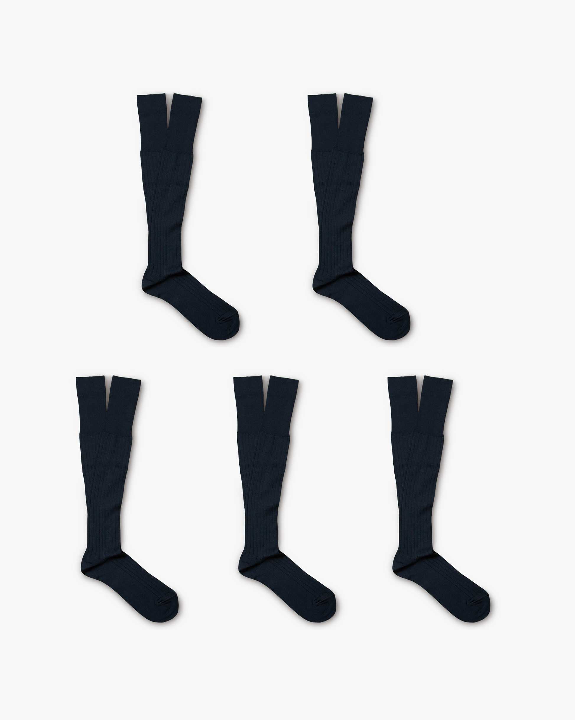 Studio shot of Nils – Knee-High Cotton Socks 5-pack, with five pairs of navy socks arranged on a white background.