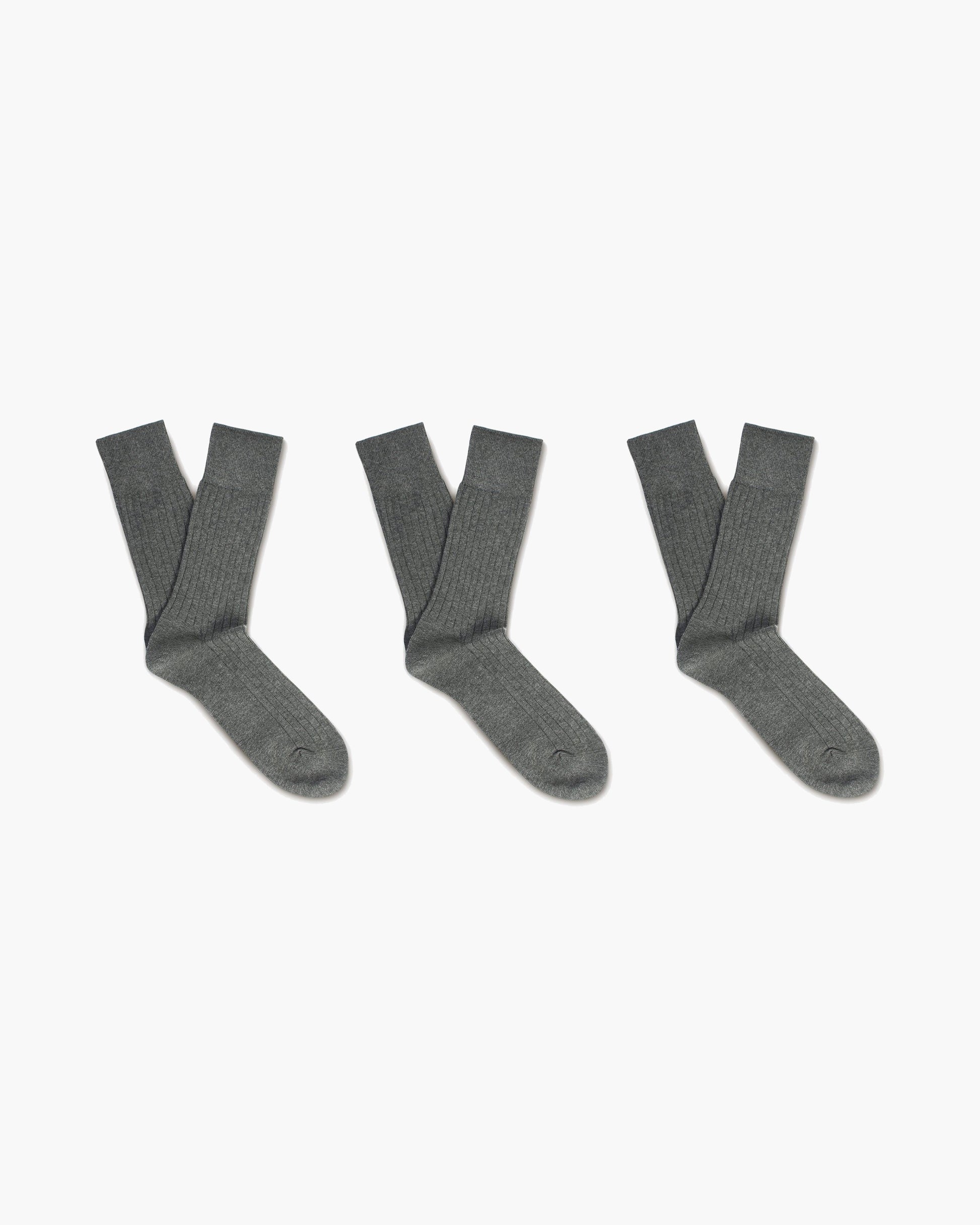 A three-pack of grey ribbed Oscar – Cotton Socks, laid flat against a white background.