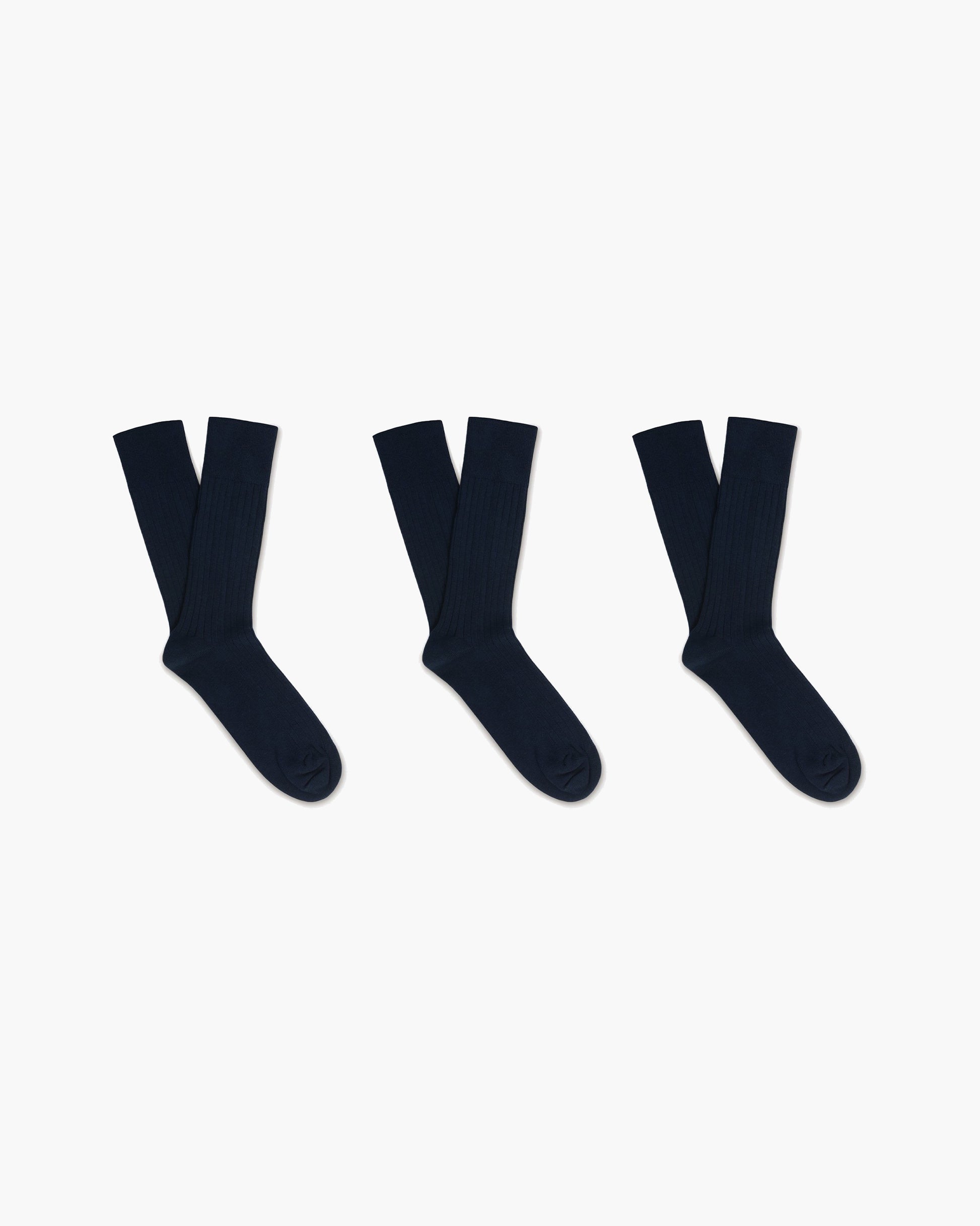 A 3-pack of Oscar – Cotton Socks in navy, laid out flat on a white background.