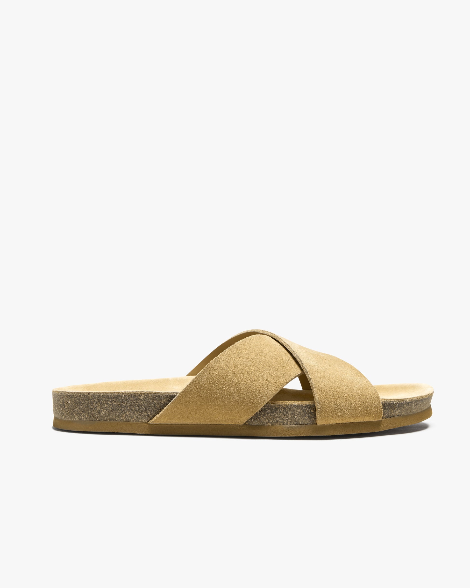 Side profile of the Solvik – Sand Suede sandal, showcasing the criss-cross straps and cork footbed.