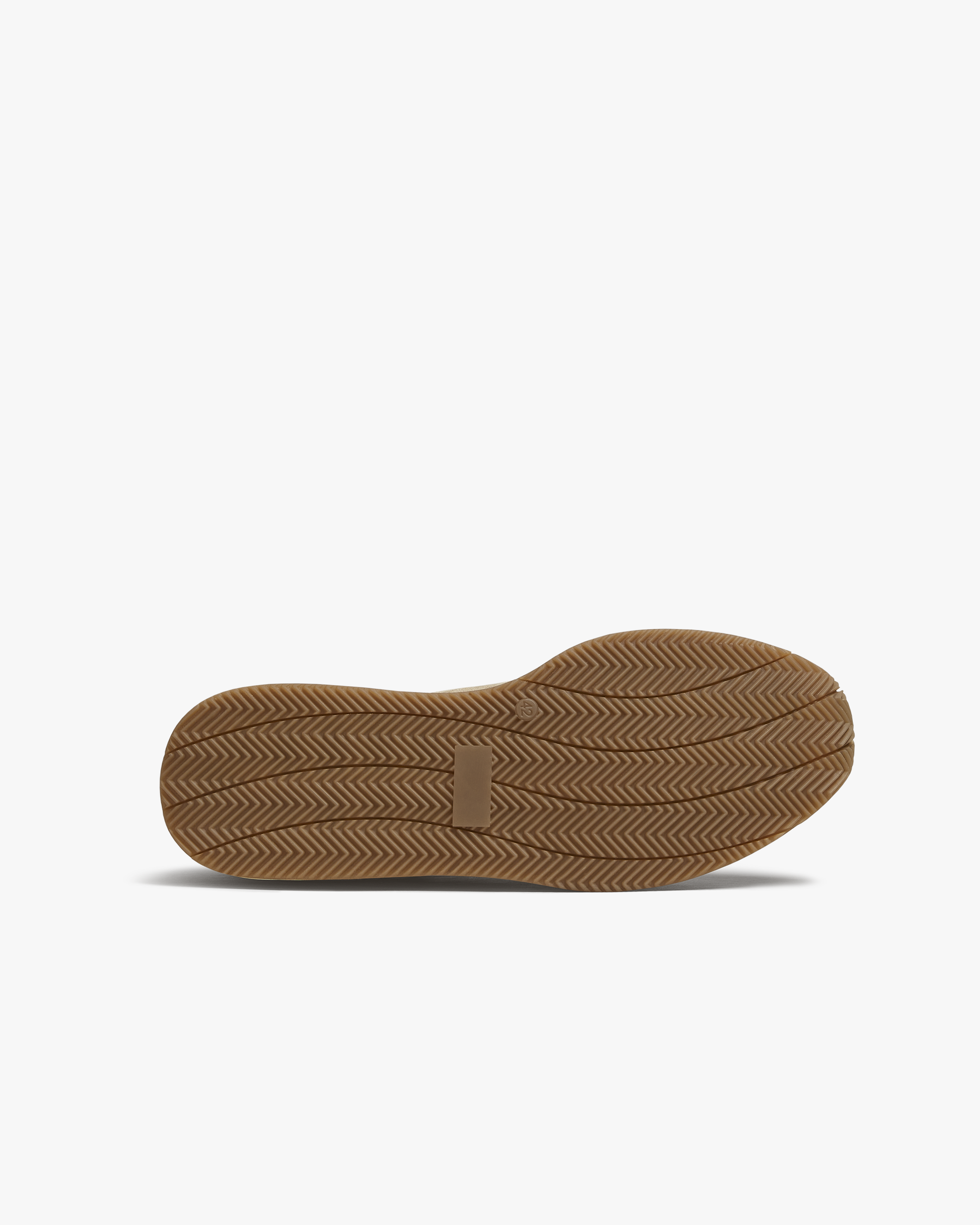 A close-up of the rubber outsole on Stensund – Navy Suede, detailing the herringbone pattern for traction.