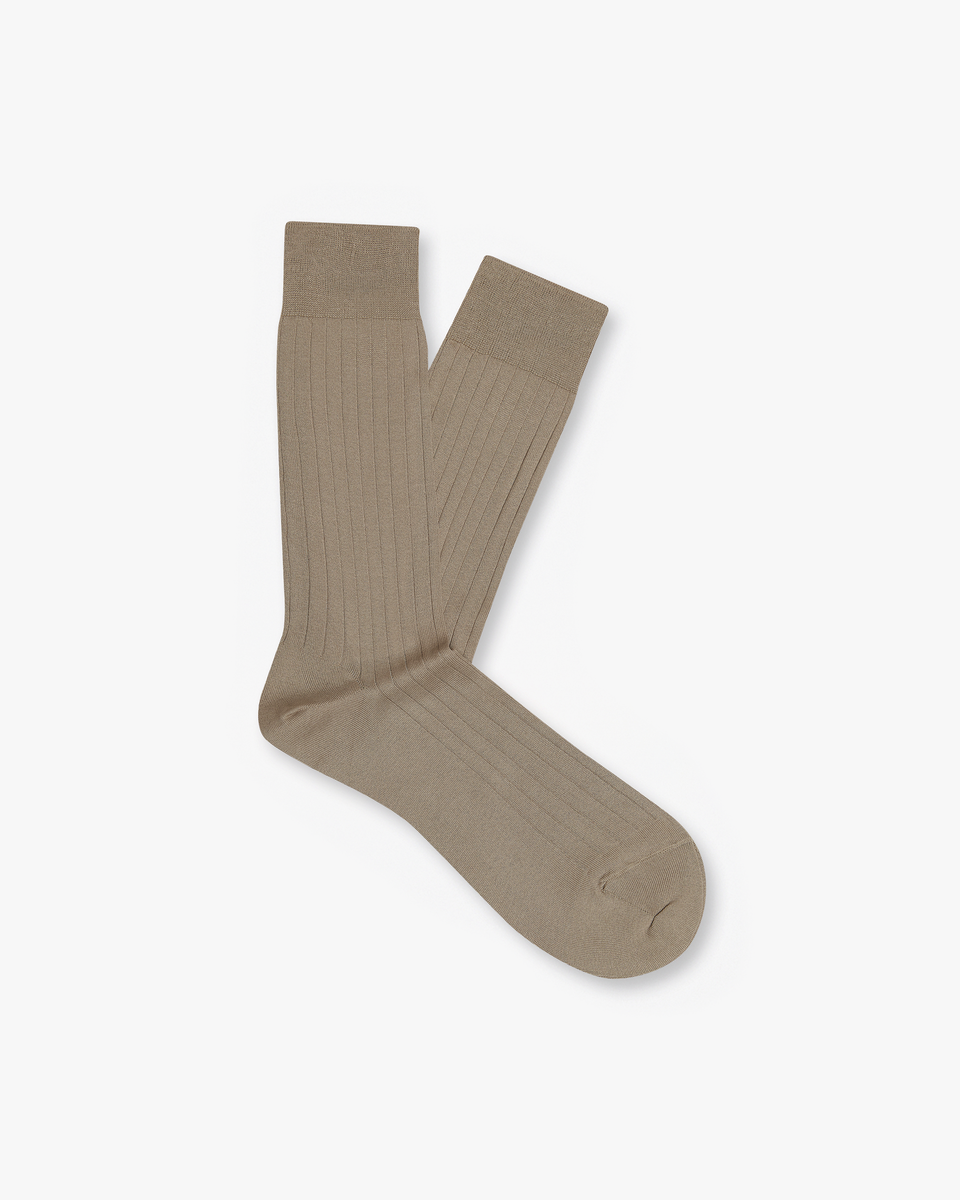 A pair of Axel – Cotton Socks in beige, laid flat on a white background to show their ribbed texture.