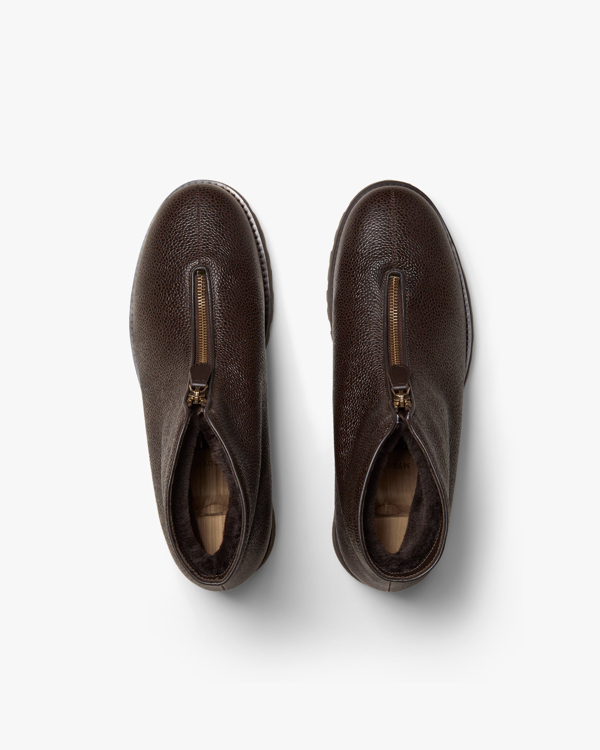 Top-down view of Funäs – Dark Brown Country Calf boots, showing the textured leather, zipper, and shearling lining.