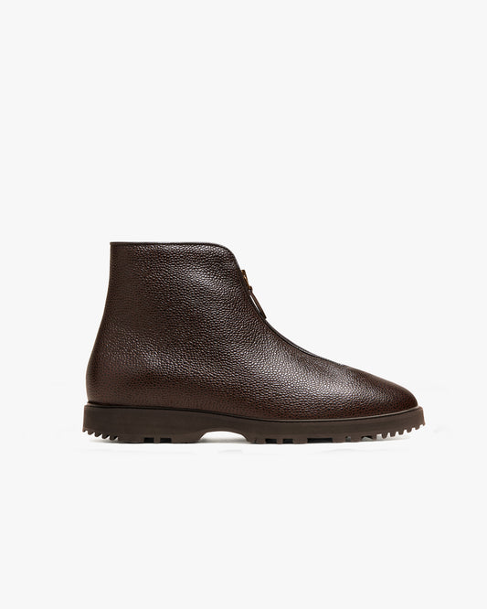 Side profile of Funäs – Dark Brown Country Calf, showcasing its textured leather, zipper closure, and robust Explorer sole.