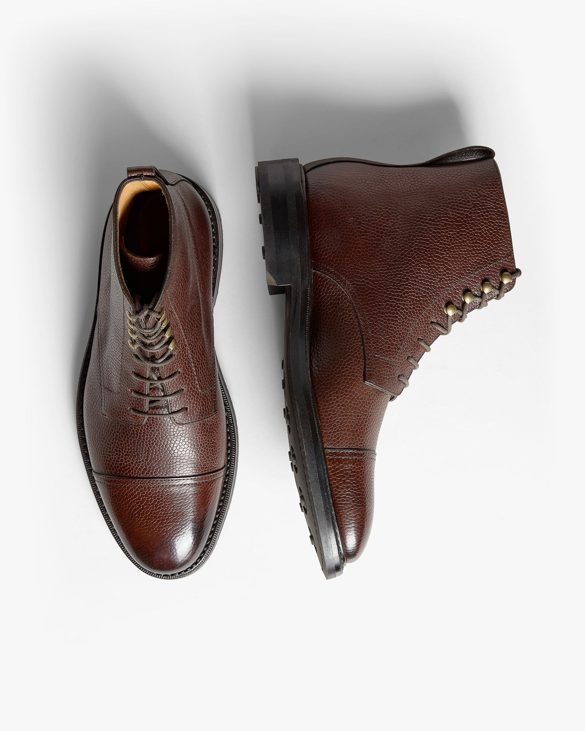 Abisko – Dark Brown Country Calf boots shown as a pair from above, displaying grained leather and cap toe.