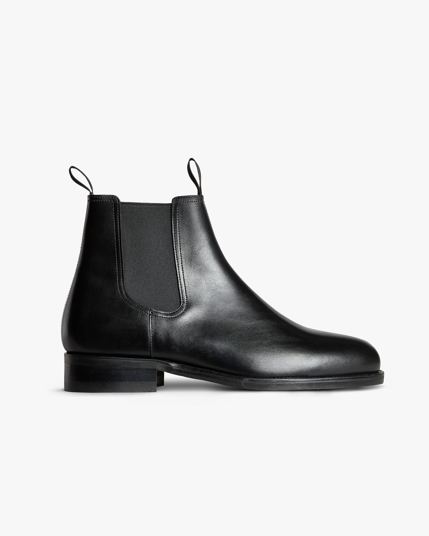 Elfvik II – Black Calf Chelsea boot shown in a clean side profile, highlighting its smooth leather and elastic side panel.