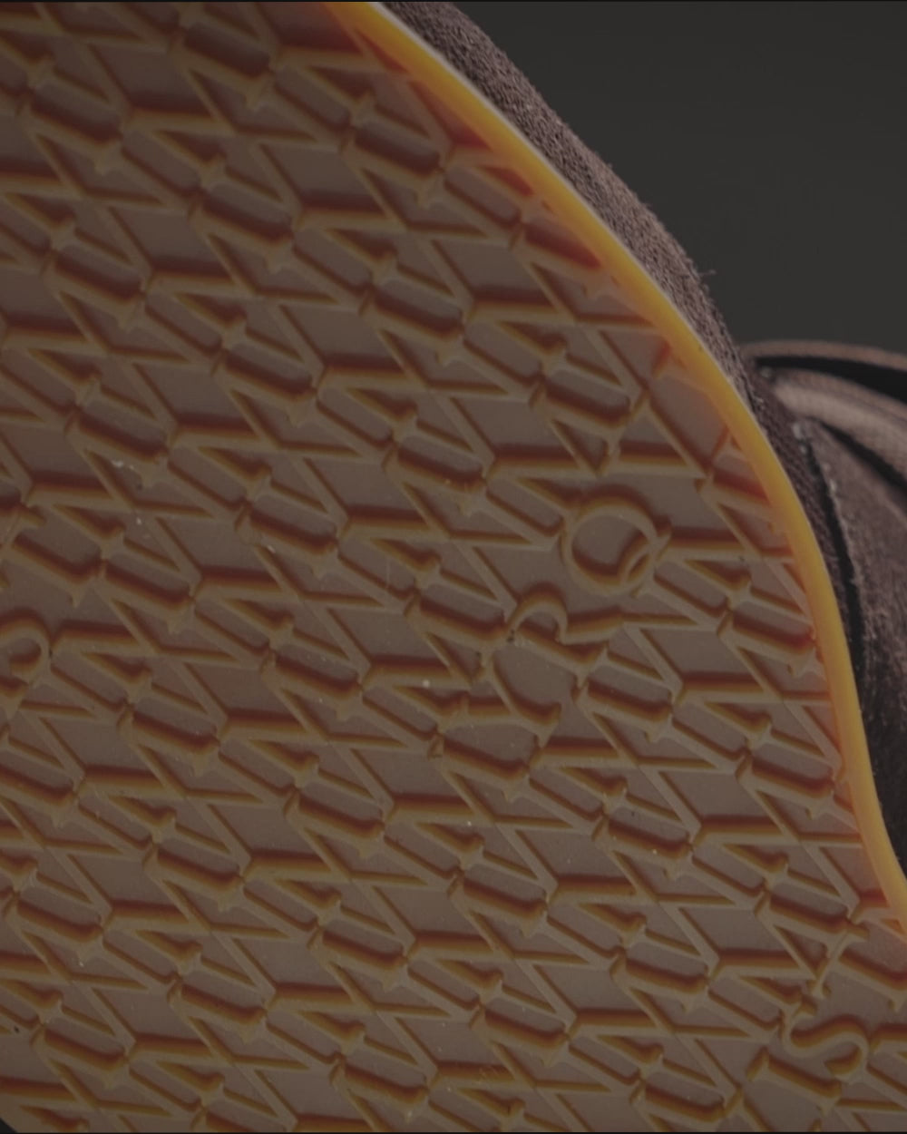 Stensund II – Dark Brown Suede sneaker showcasing soft dark brown suede and sporty mesh panels paired with tailored trousers.