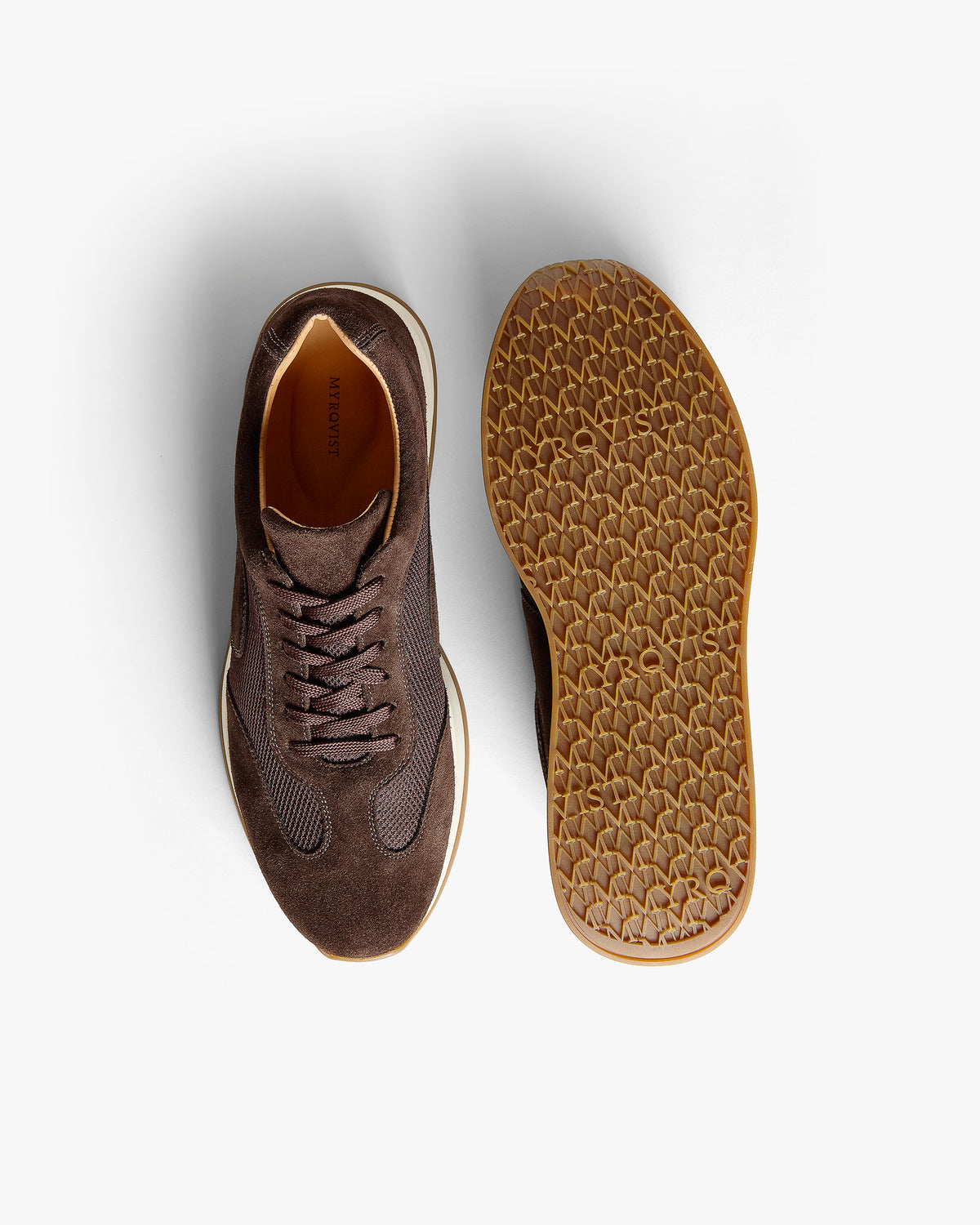 Stensund II – Dark Brown Suede shown from above with one shoe upright and one showing the patterned sole.