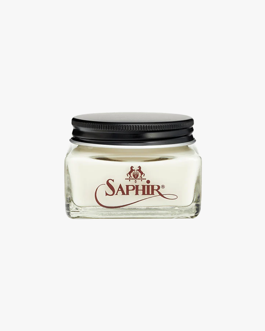 A glass jar of Saphir – Créme Renovateur, a neutral leather conditioning cream, shown against a white background.